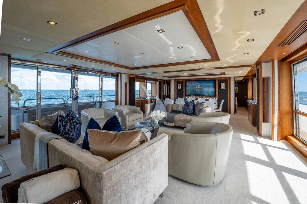 a living room with a large glass window aboard ABOUT TIME Yacht for Sale