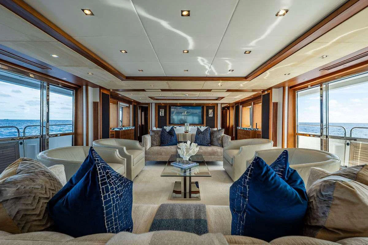 a living room with a large window aboard ABOUT TIME Yacht for Sale