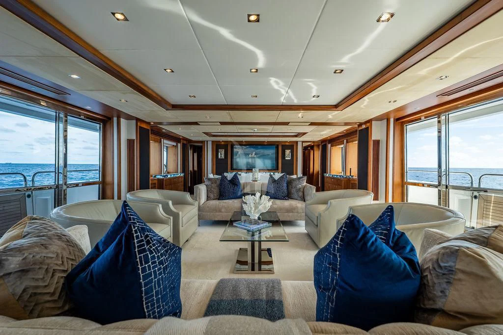 a living room with a large window aboard ABOUT TIME Yacht for Sale
