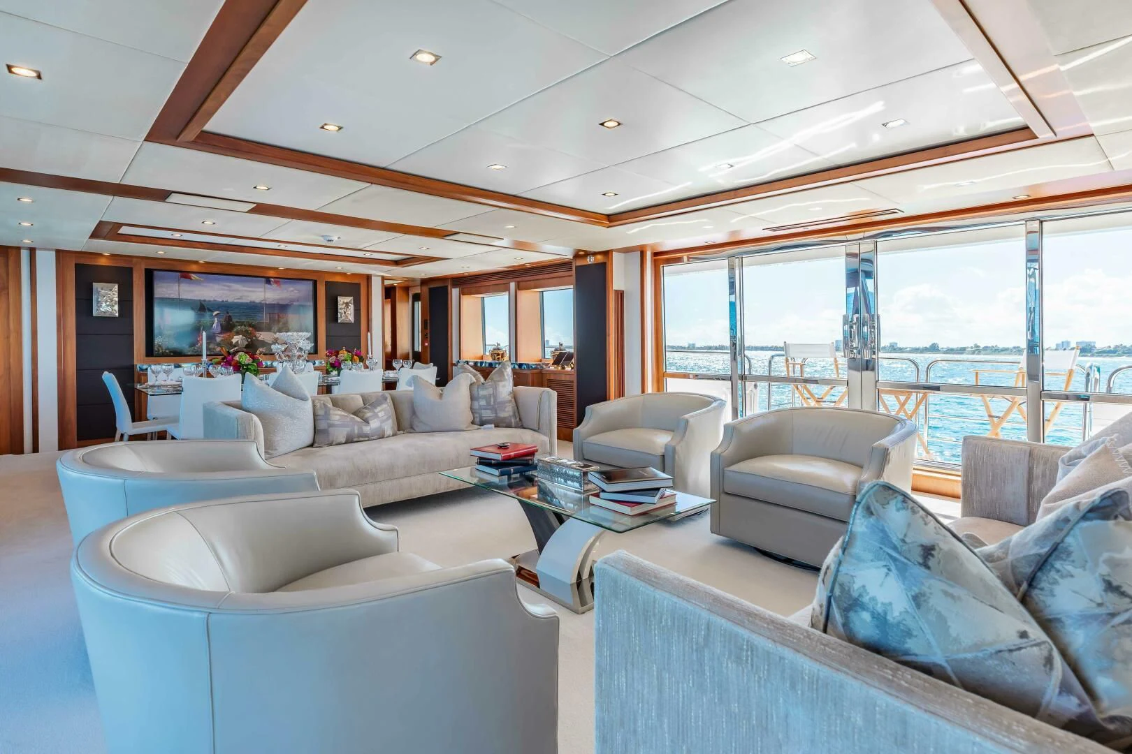 a living room with a large window aboard ABOUT TIME Yacht for Sale