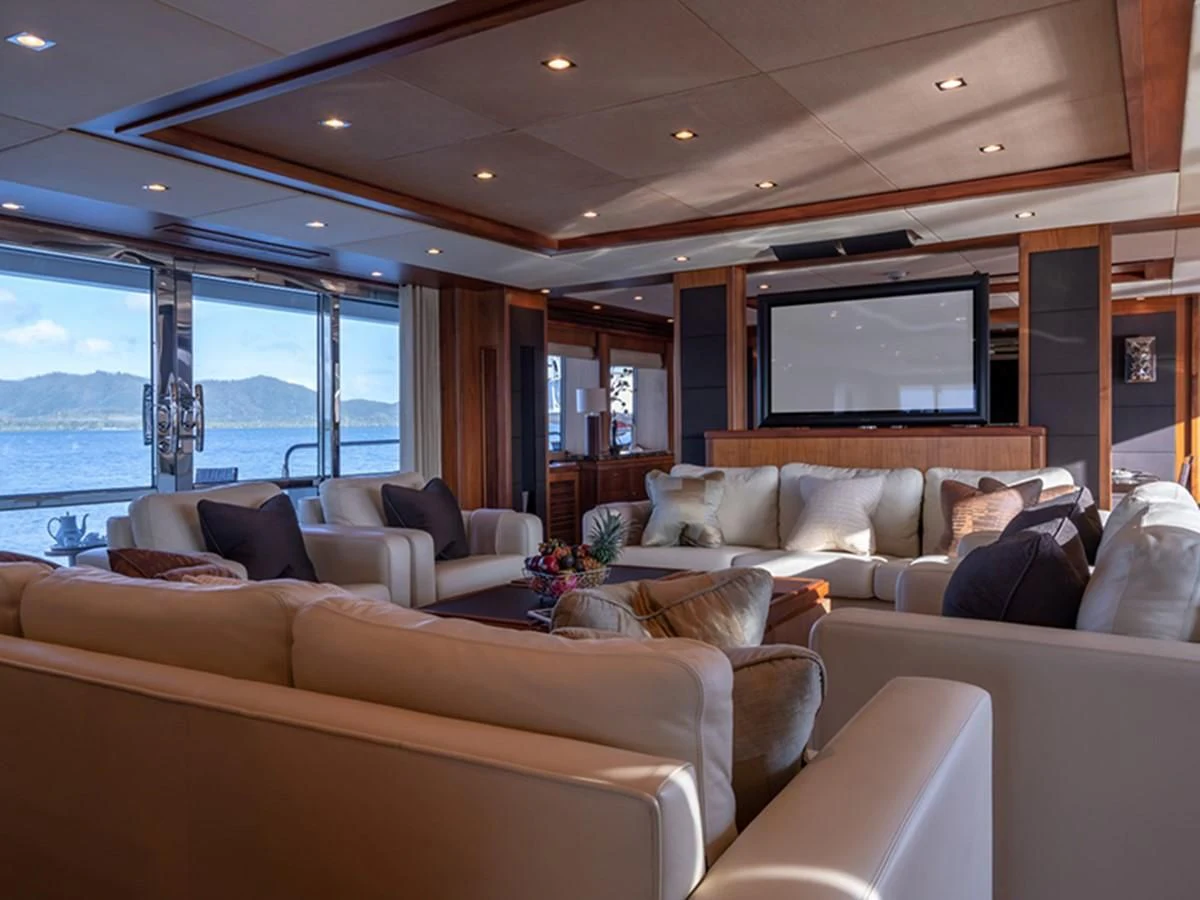 a living room with a large window aboard ABOUT TIME Yacht for Sale