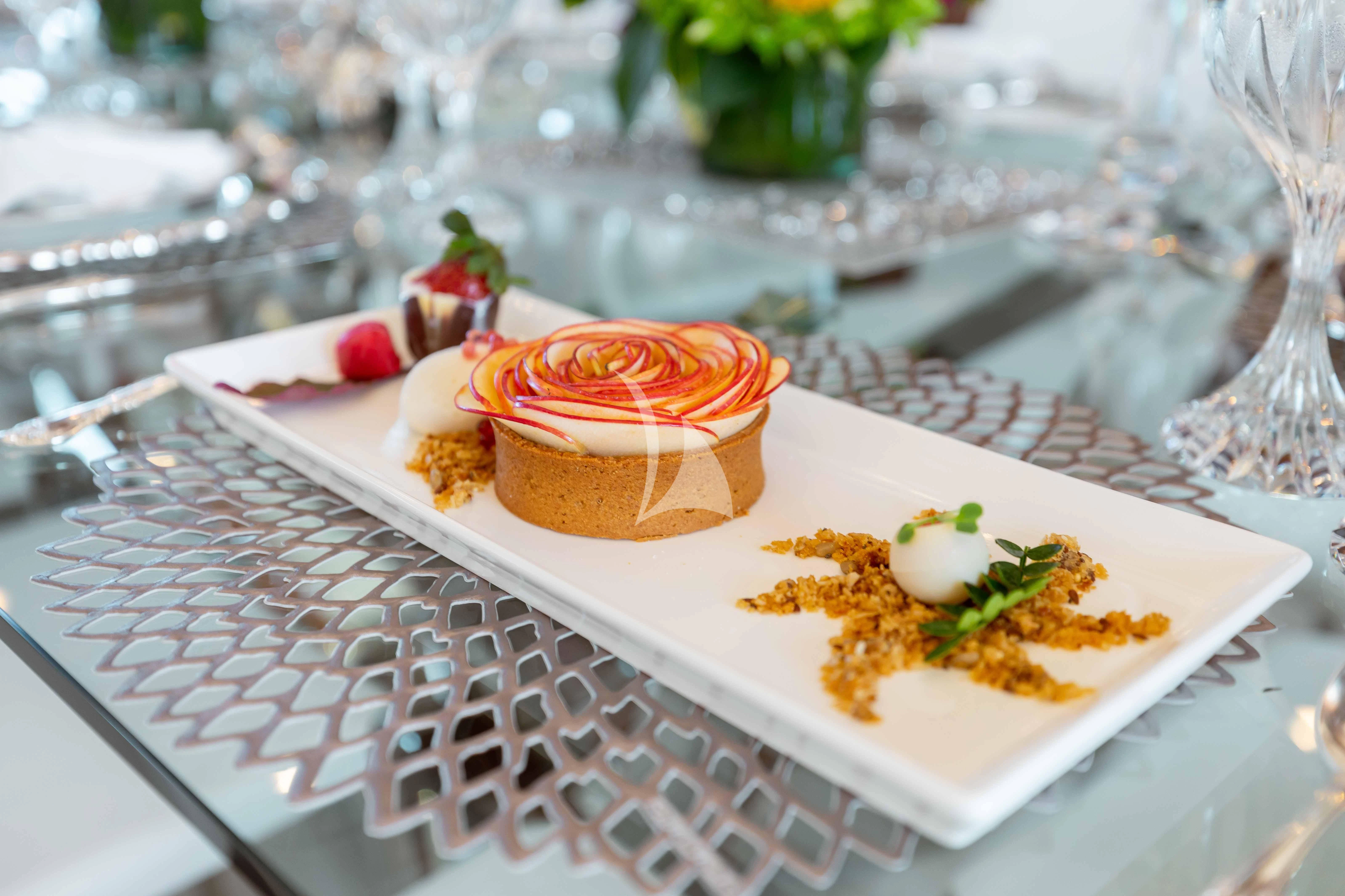 a cupcake on a table aboard ABOUT TIME Yacht for Sale