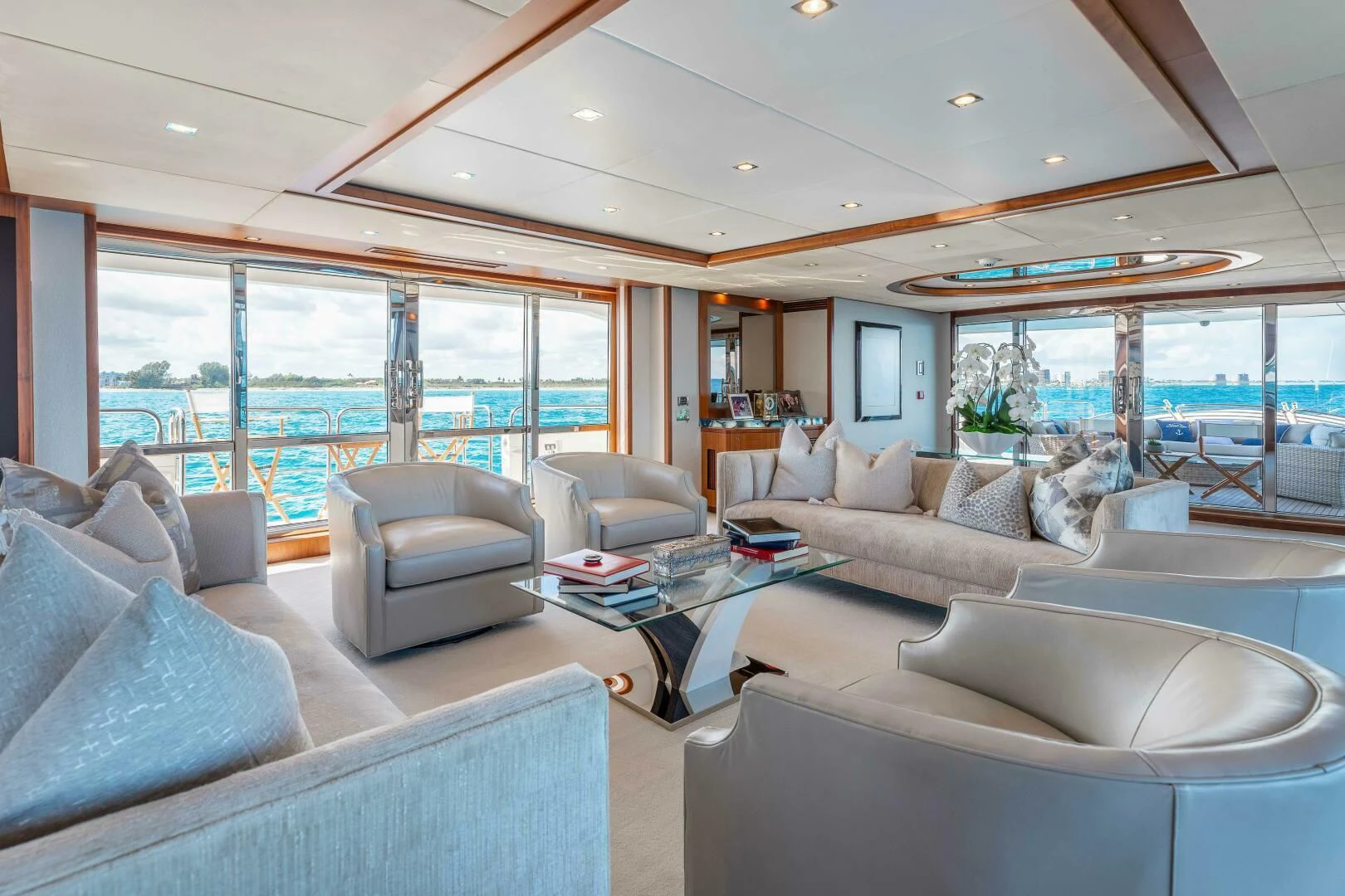 a living room with a large glass window aboard ABOUT TIME Yacht for Sale