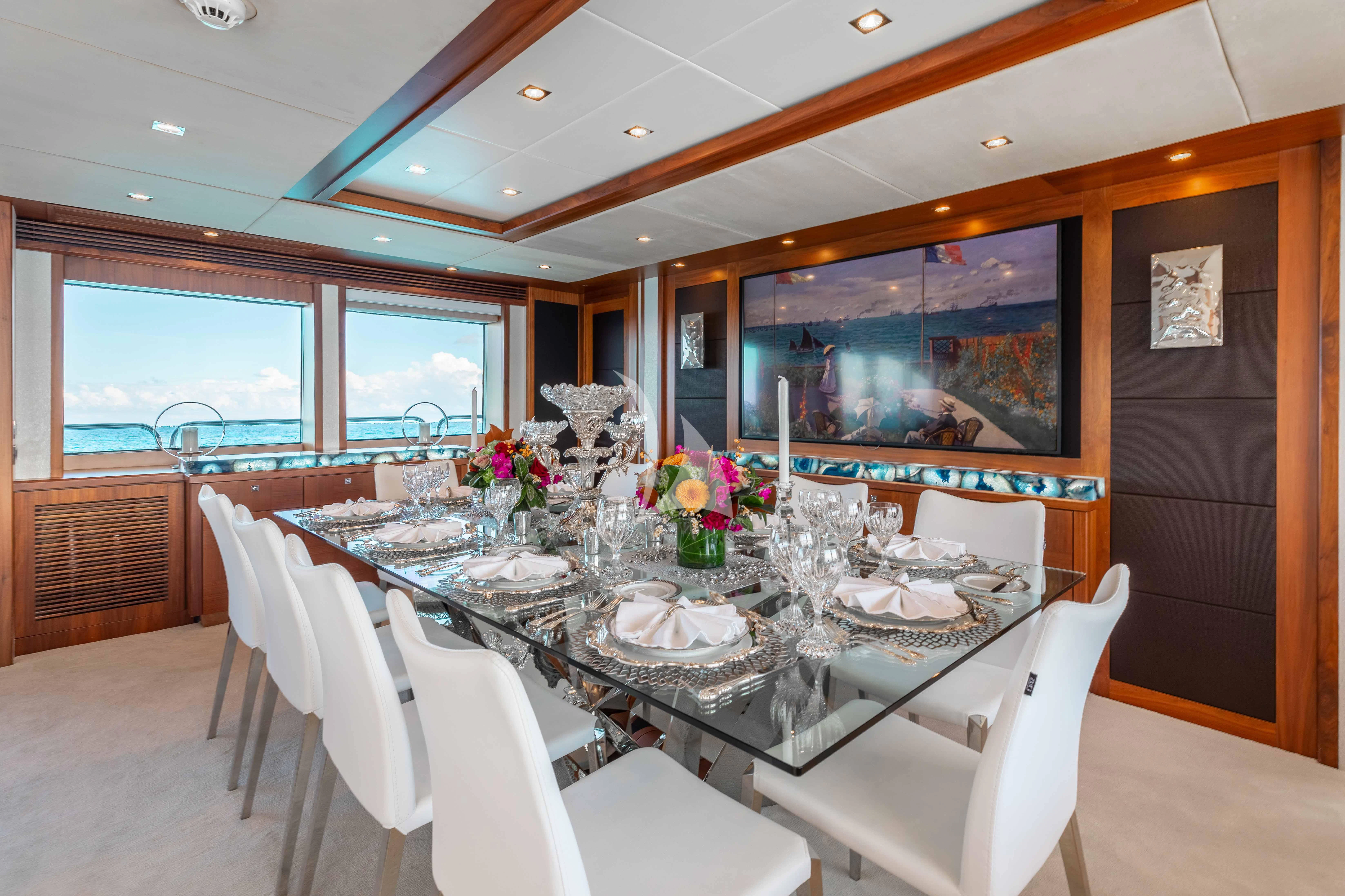 a table set for a dinner aboard ABOUT TIME Yacht for Sale