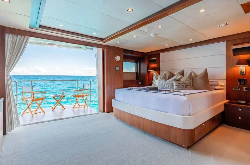 a large bed in a room aboard ABOUT TIME Yacht for Sale
