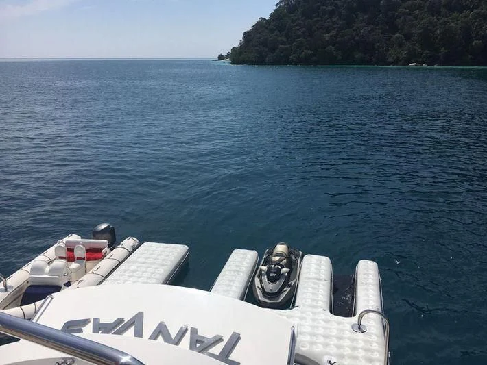 a boat on the water aboard ABOUT TIME Yacht for Sale