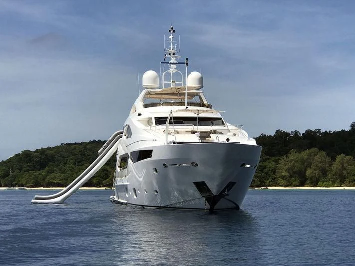 a large white boat in the water aboard ABOUT TIME Yacht for Sale