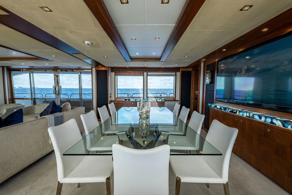 a room with a table and chairs aboard ABOUT TIME Yacht for Sale