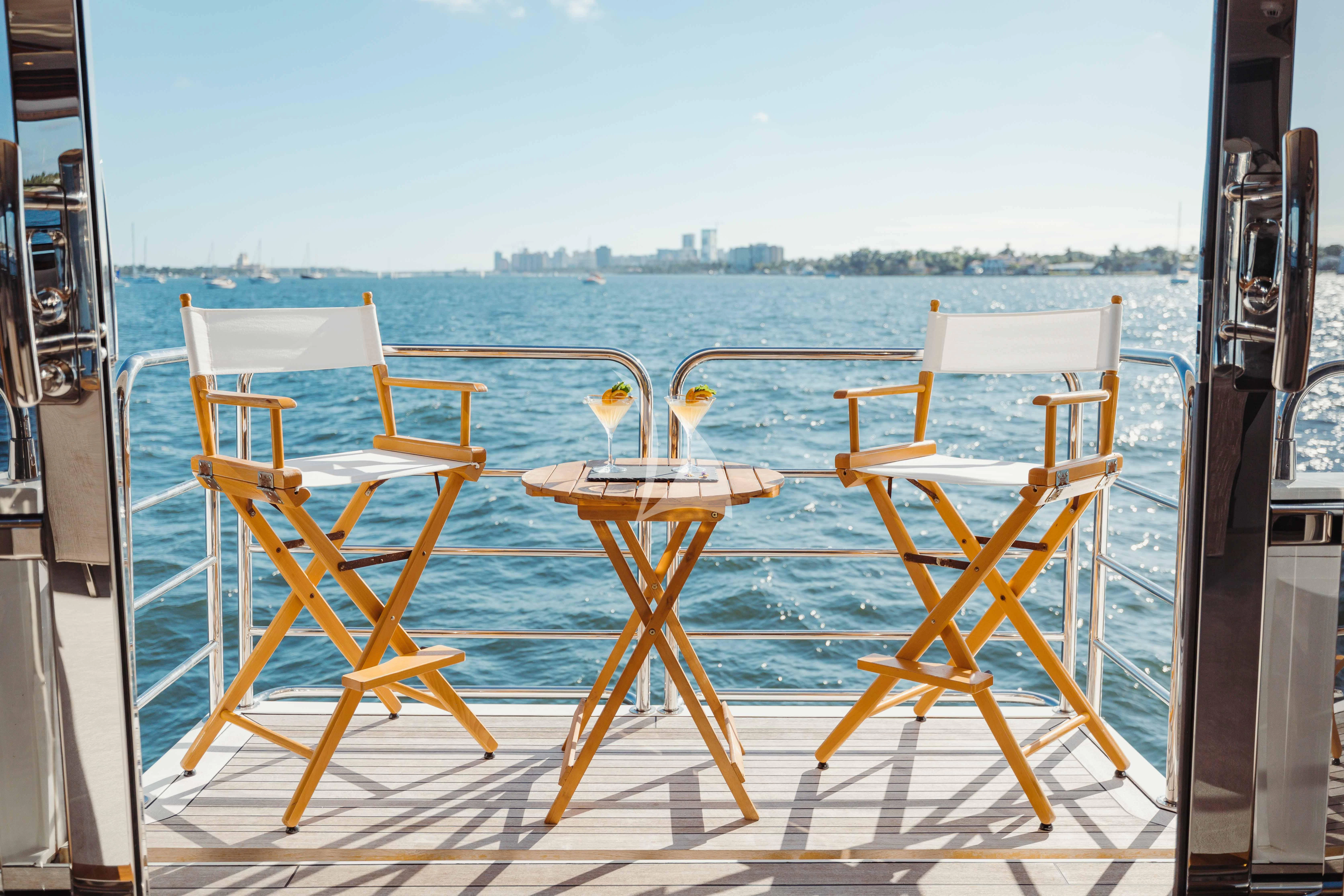 a group of chairs on a boat aboard ABOUT TIME Yacht for Sale