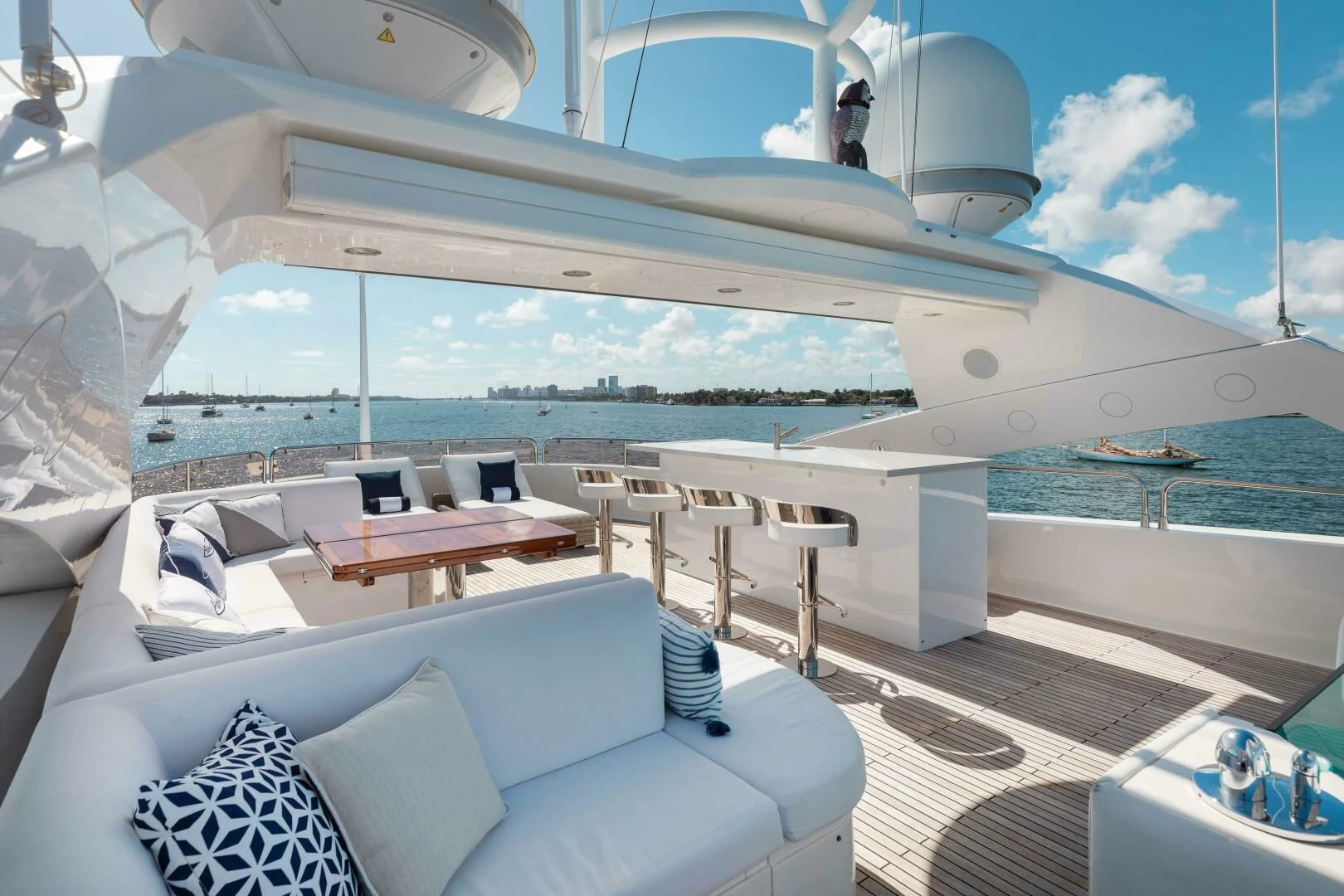 a large white boat with a large white lounge chair and a large window aboard ABOUT TIME Yacht for Sale