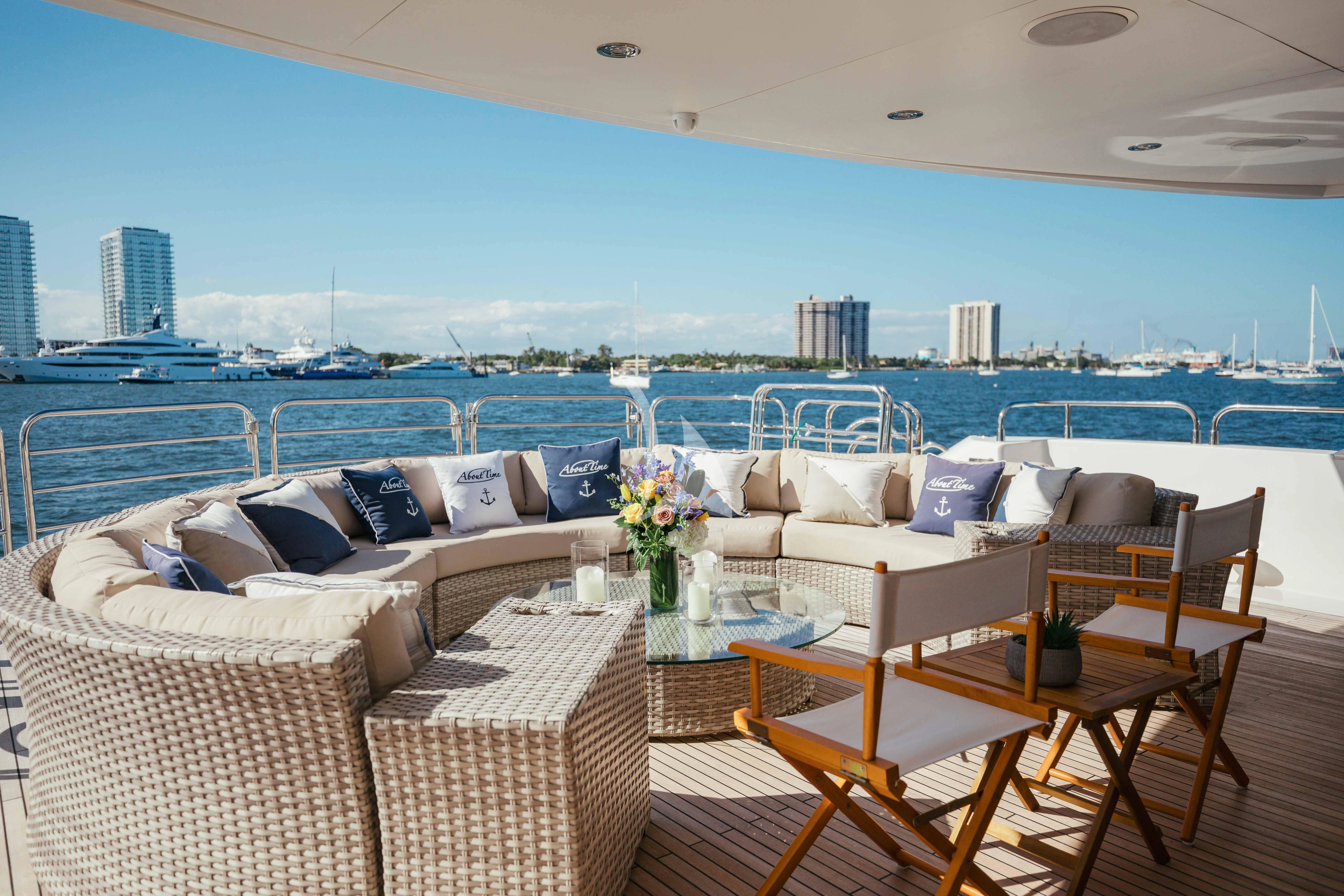 a patio with a large blue ocean aboard ABOUT TIME Yacht for Sale