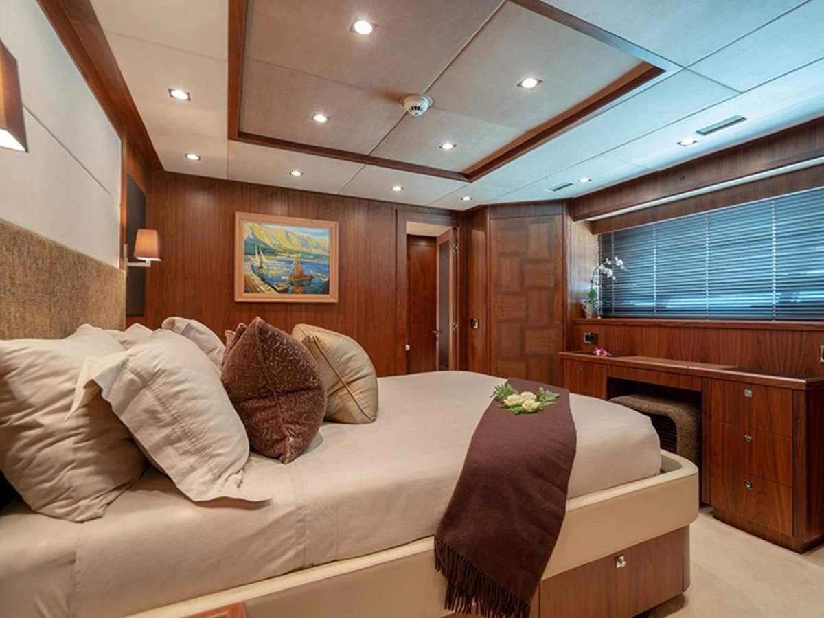 a bed in a room aboard ABOUT TIME Yacht for Sale