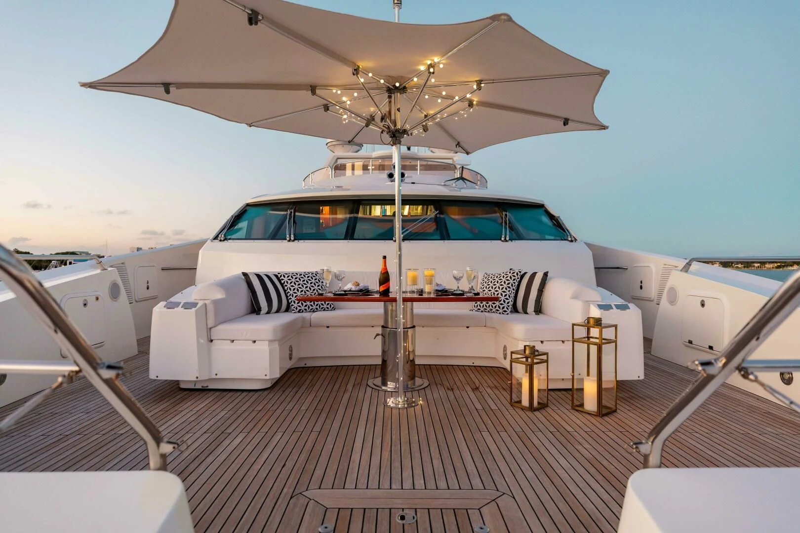 a white car on a platform aboard ABOUT TIME Yacht for Sale