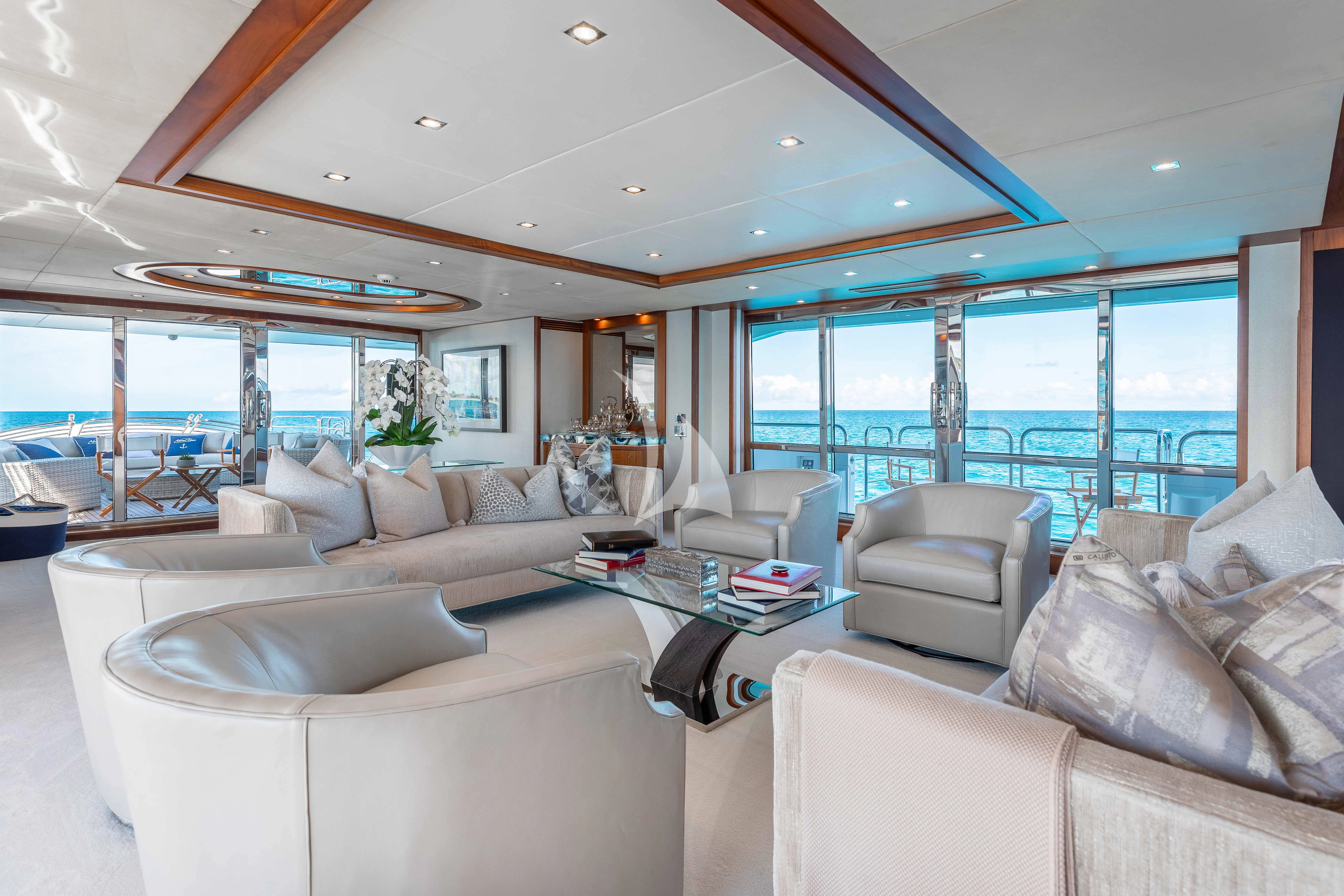 a living room with a large window aboard ABOUT TIME Yacht for Sale