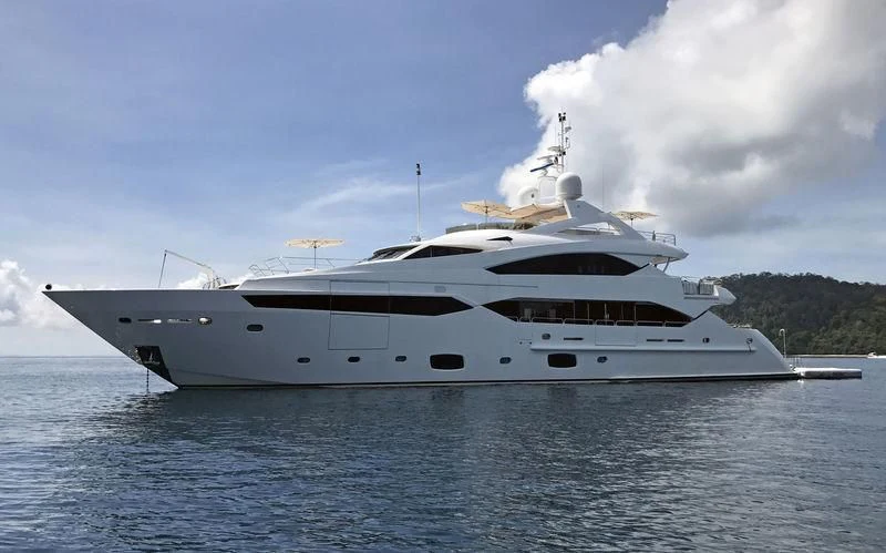 a large white ship on the water aboard ABOUT TIME Yacht for Sale