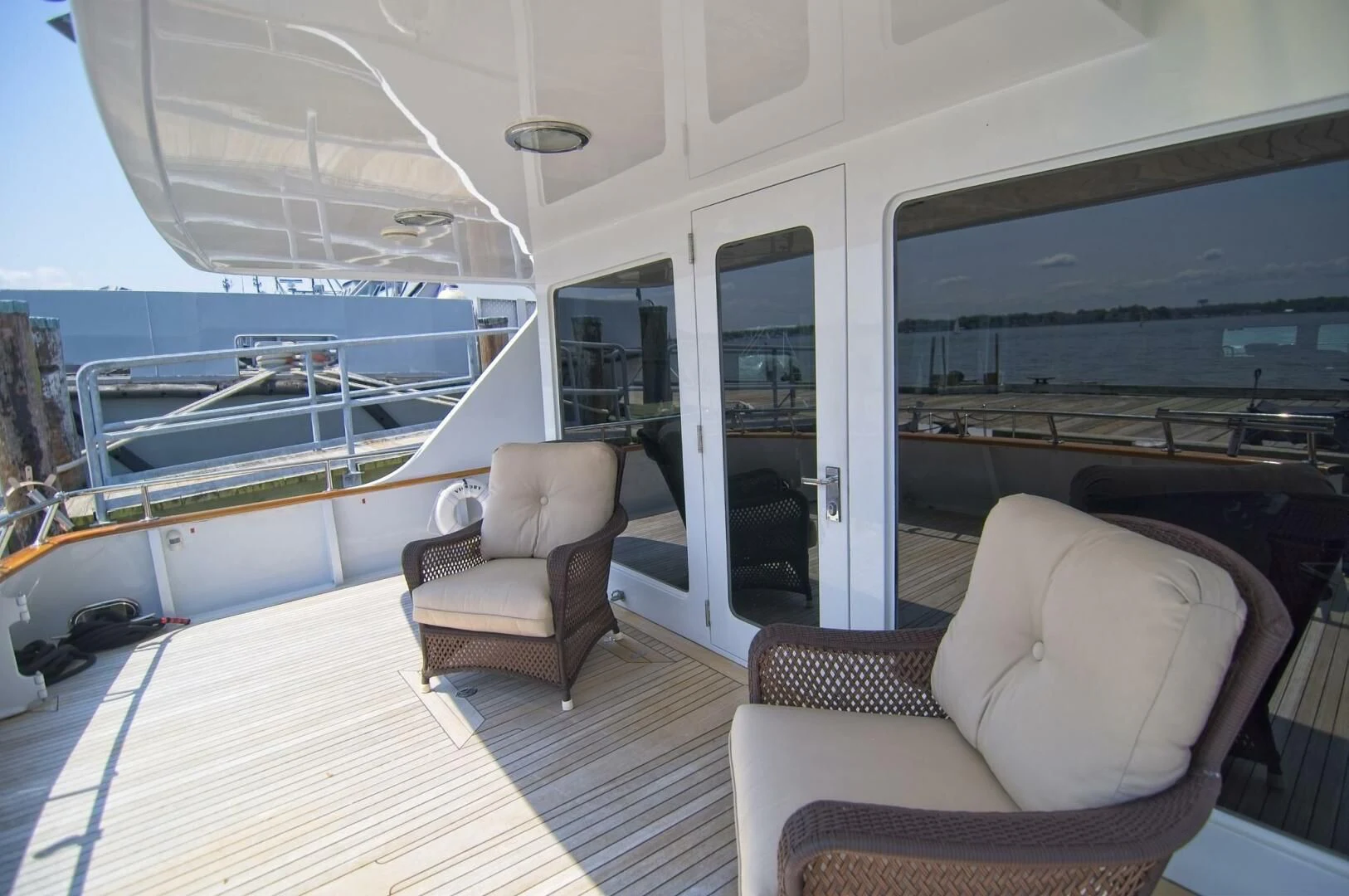 a living room with a view of the ocean aboard VICTORY Yacht for Sale