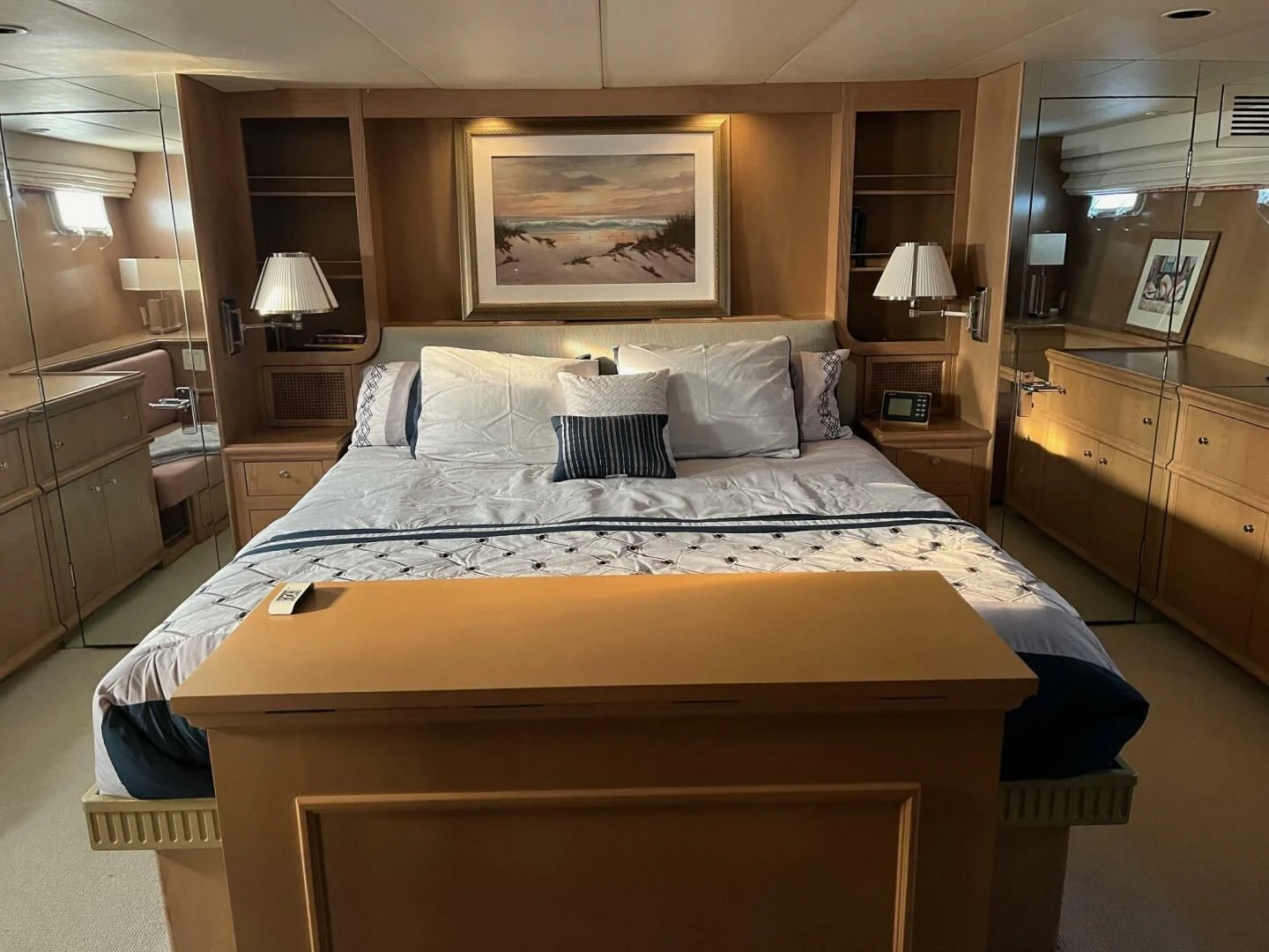 a bed with a white comforter aboard VICTORY Yacht for Sale