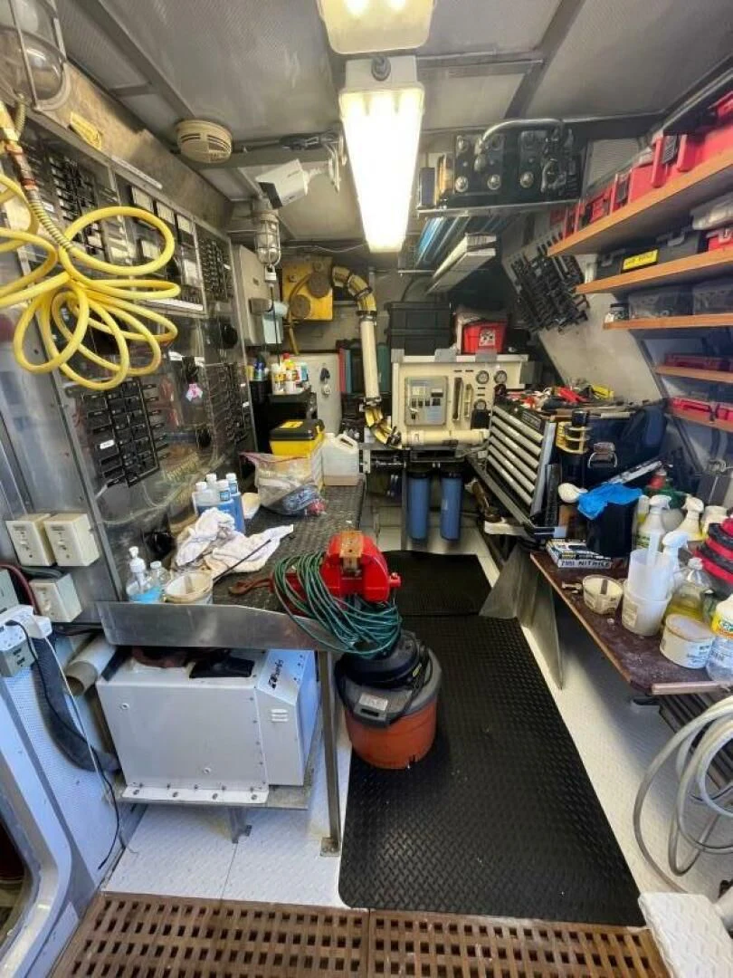 a room with machinery and tools aboard VICTORY Yacht for Sale