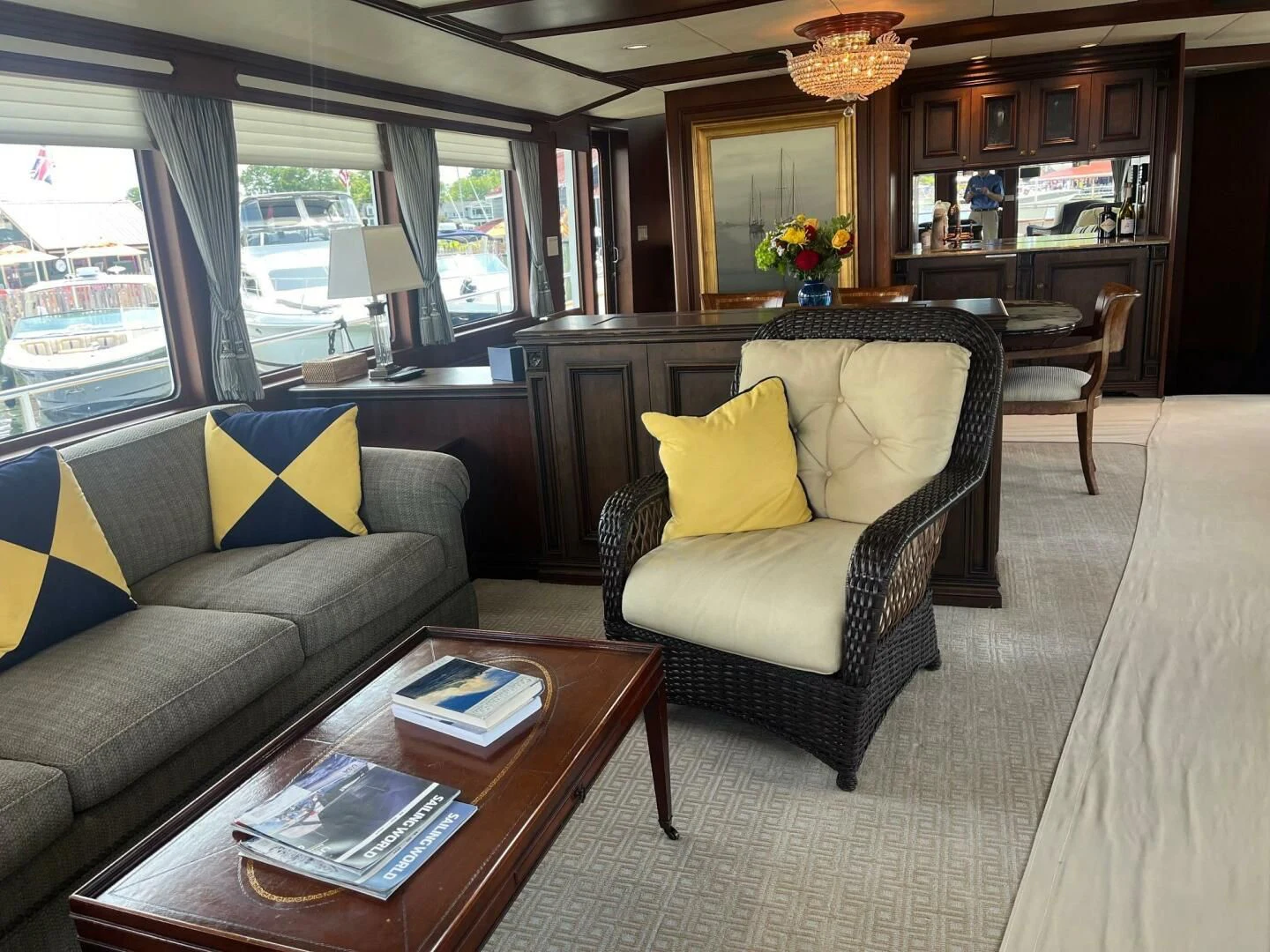 a living room with a couch and a coffee table aboard VICTORY Yacht for Sale