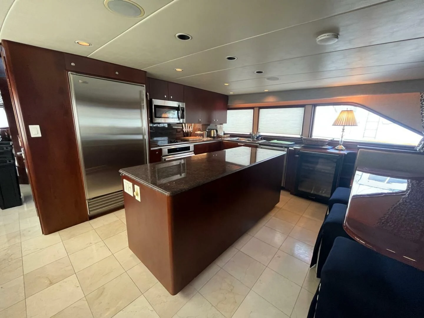 a kitchen with a bar and a bar aboard VICTORY Yacht for Sale