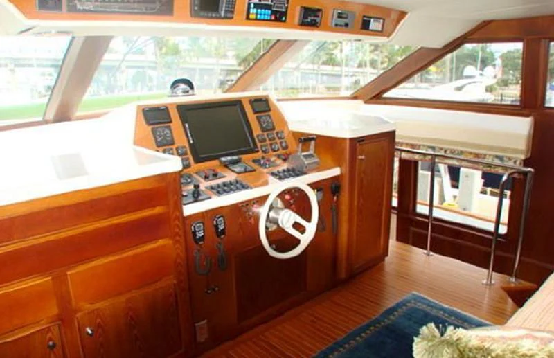 a small wooden desk with a computer aboard VICTORY Yacht for Sale