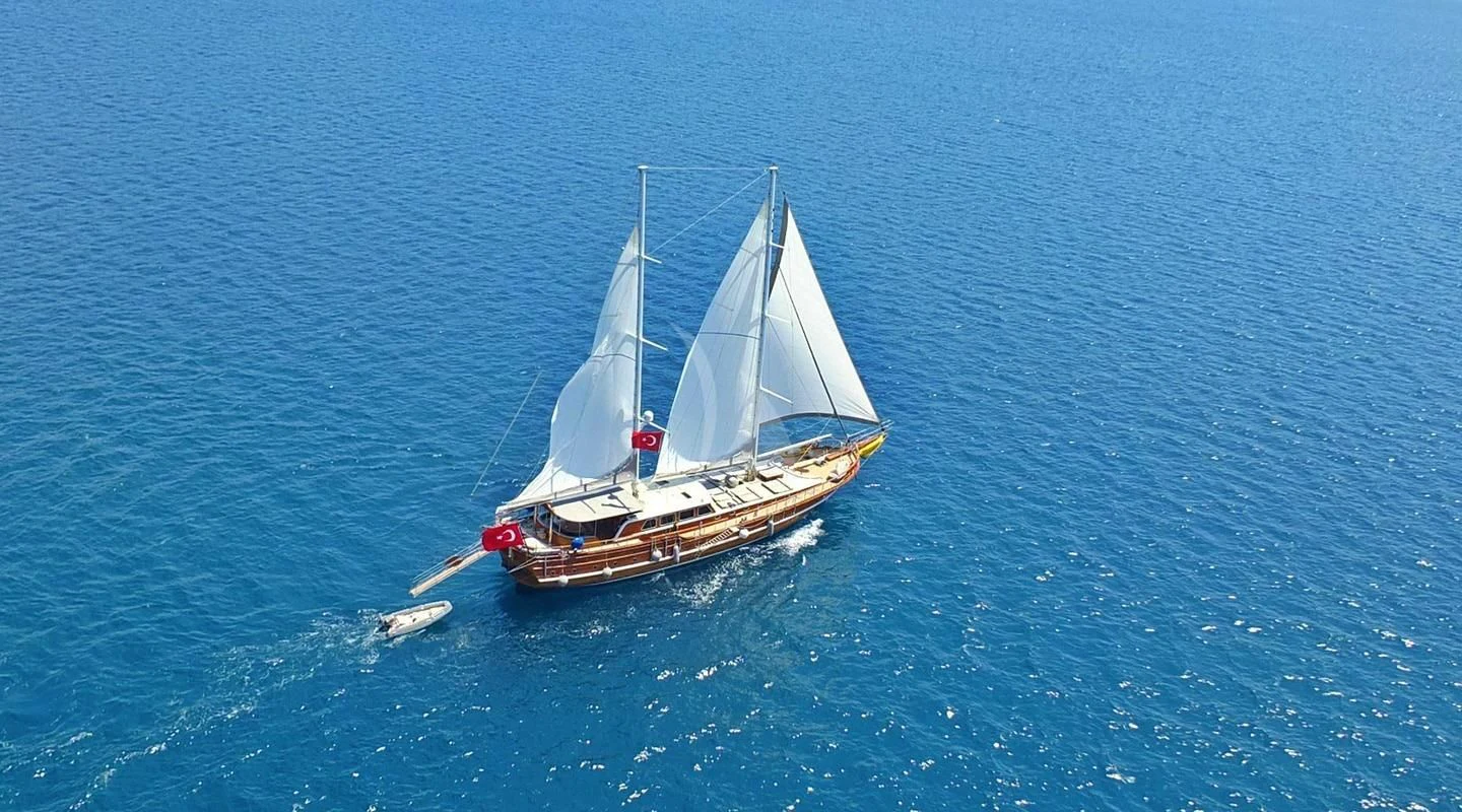 a boat sailing on the water aboard KAPTAN MEHMET BUGRA Yacht for Sale
