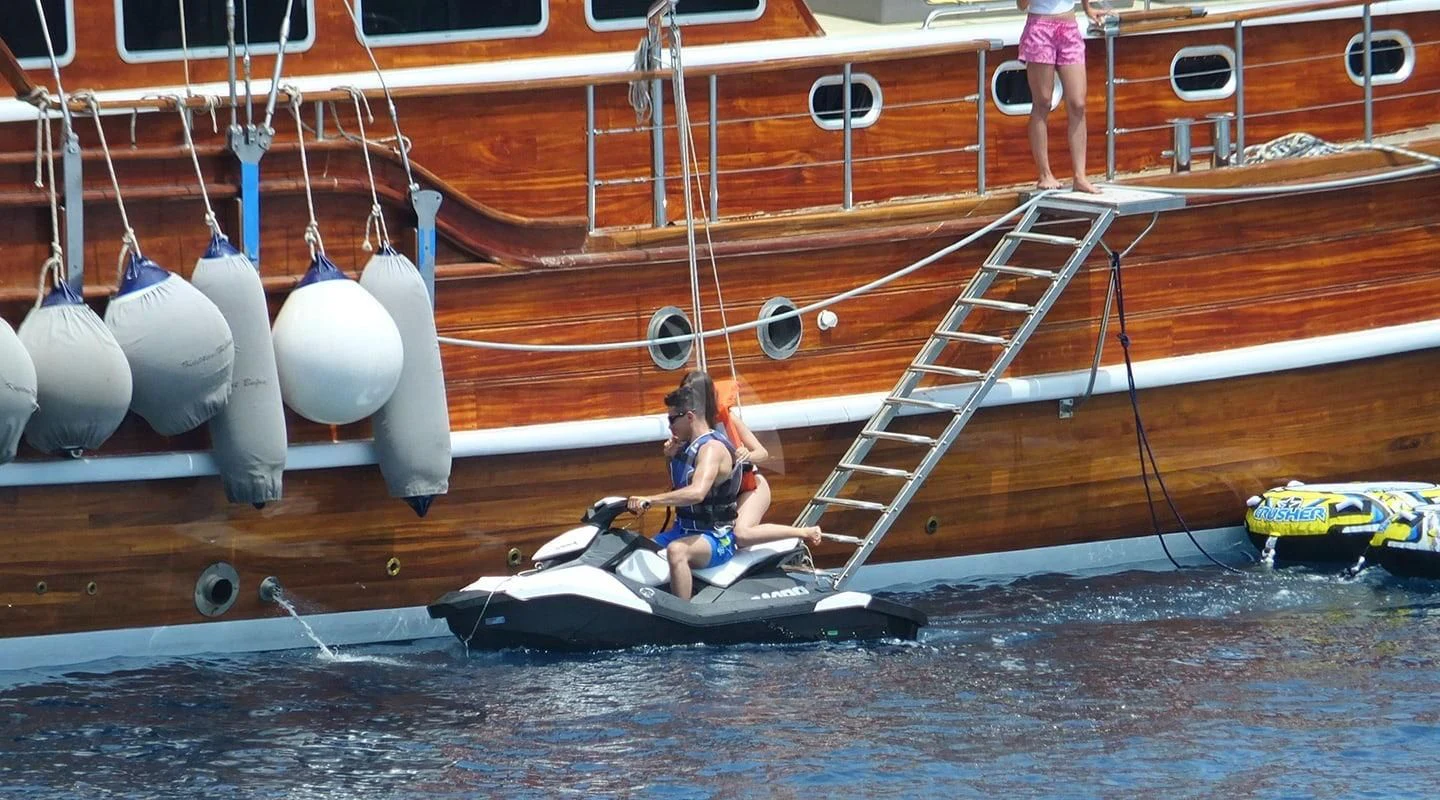 a person sitting on a boat aboard KAPTAN MEHMET BUGRA Yacht for Sale