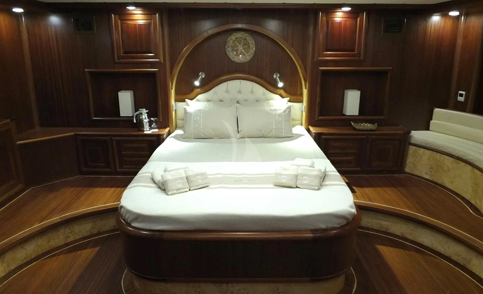 a large bed in a room aboard KAPTAN MEHMET BUGRA Yacht for Sale