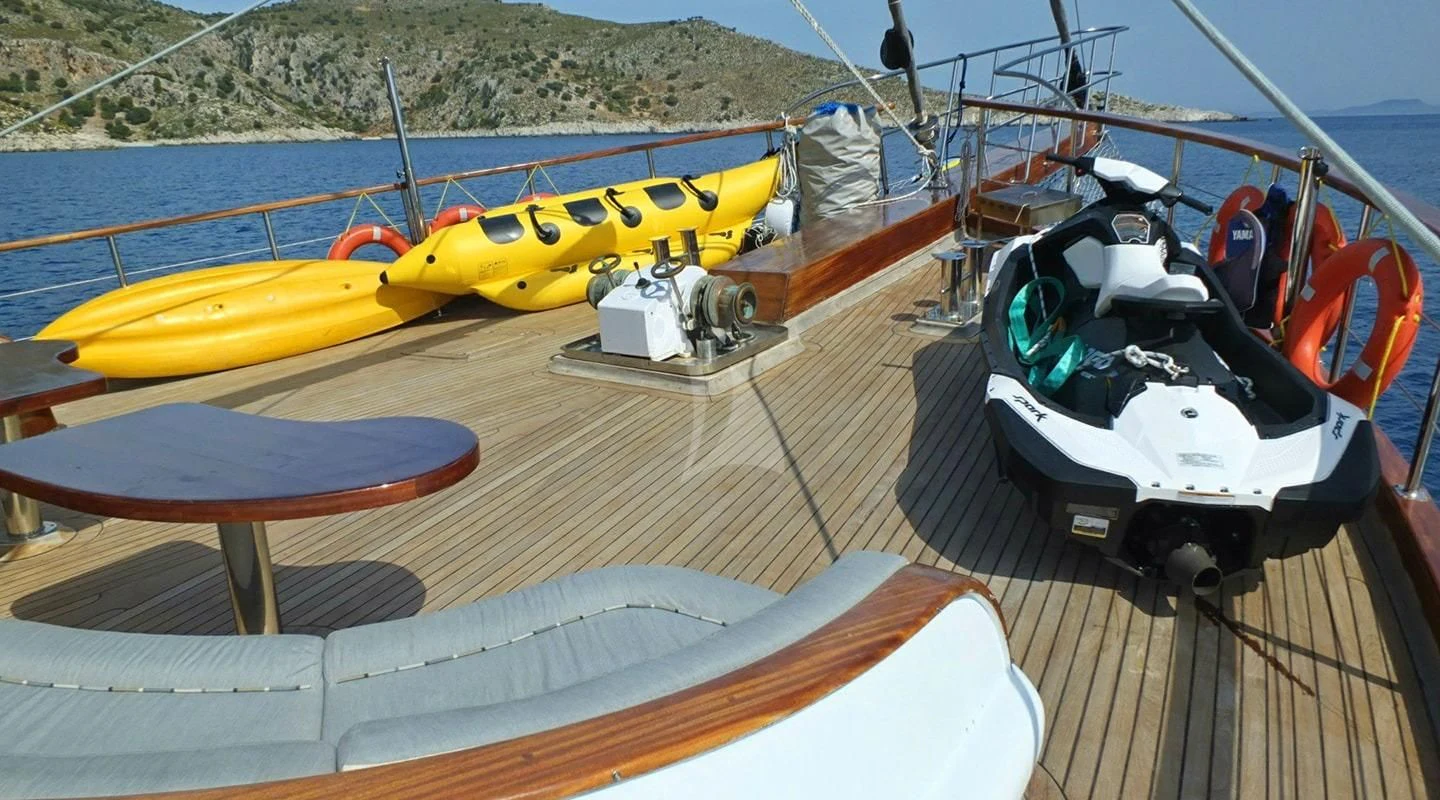 a boat with a yellow and white boat on it aboard KAPTAN MEHMET BUGRA Yacht for Sale