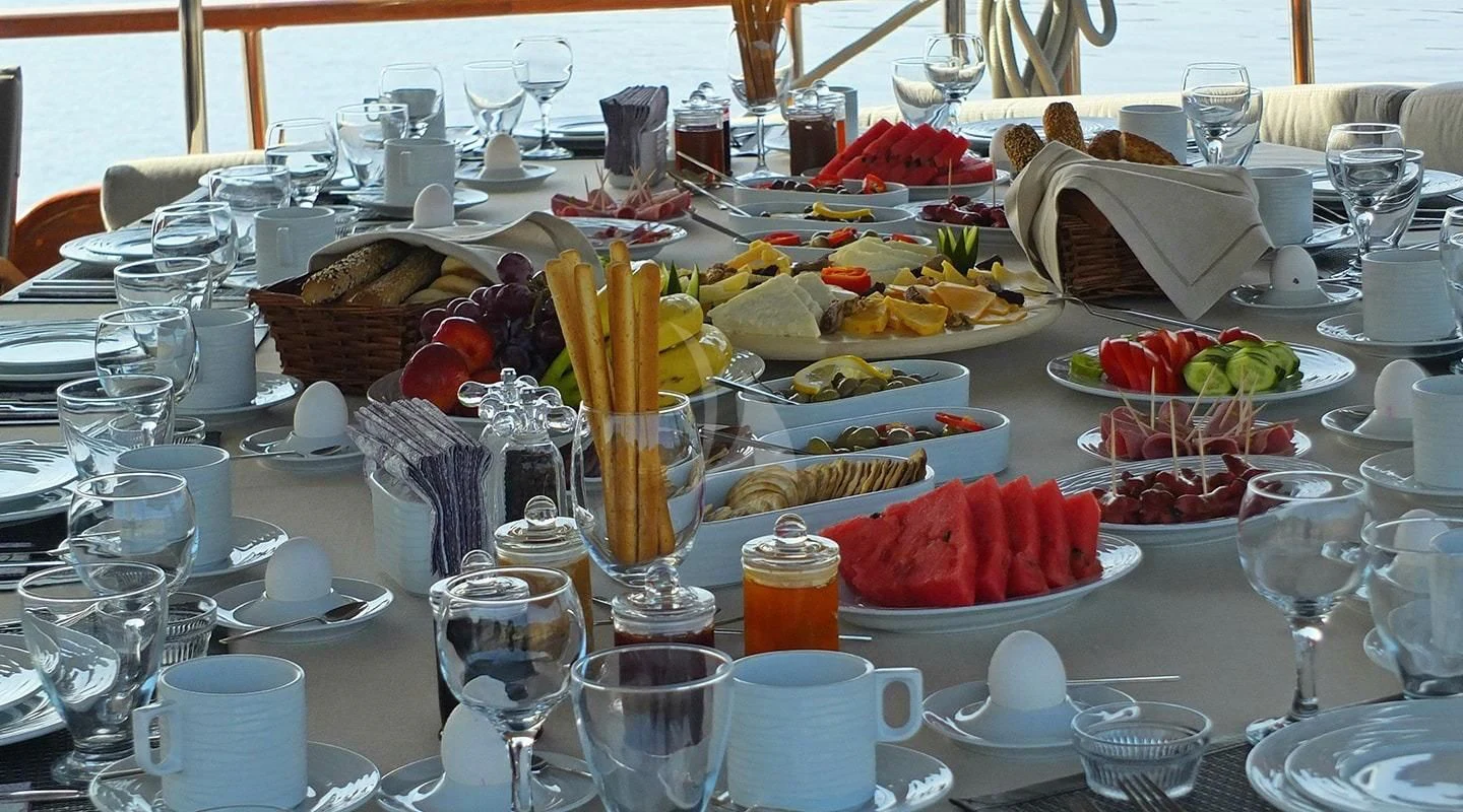 a table full of food aboard KAPTAN MEHMET BUGRA Yacht for Sale