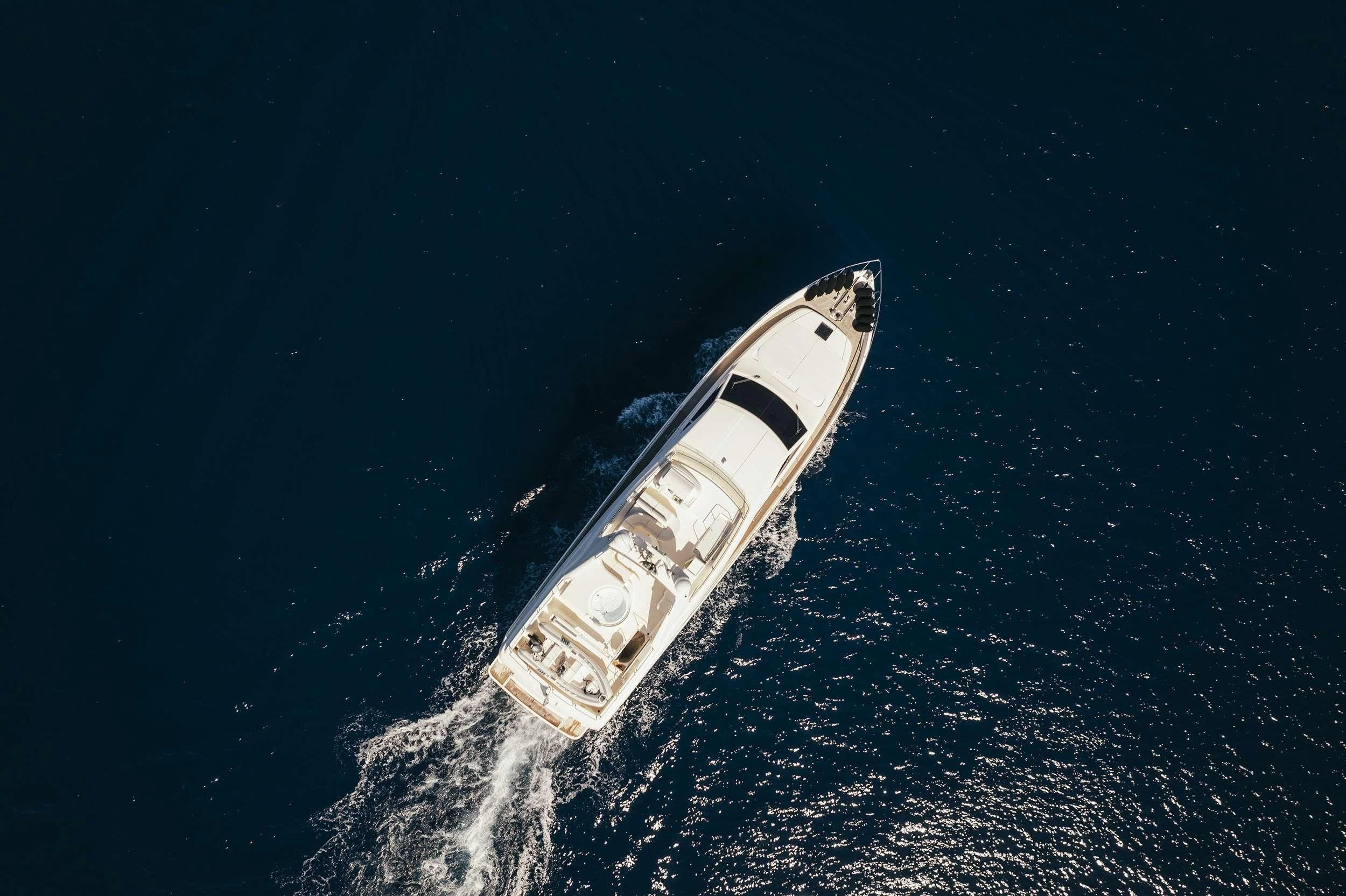 a space shuttle flying over earth aboard LIDIA Yacht for Sale