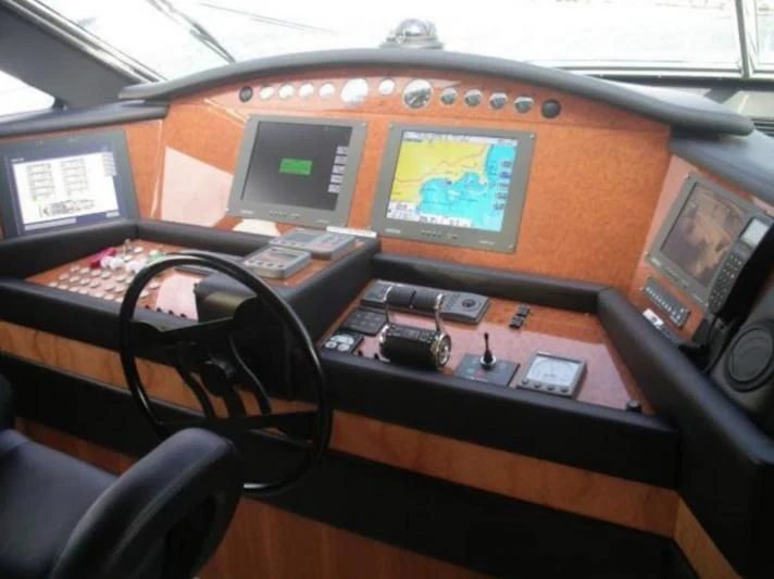 a control panel with a screen and buttons aboard LIDIA Yacht for Sale