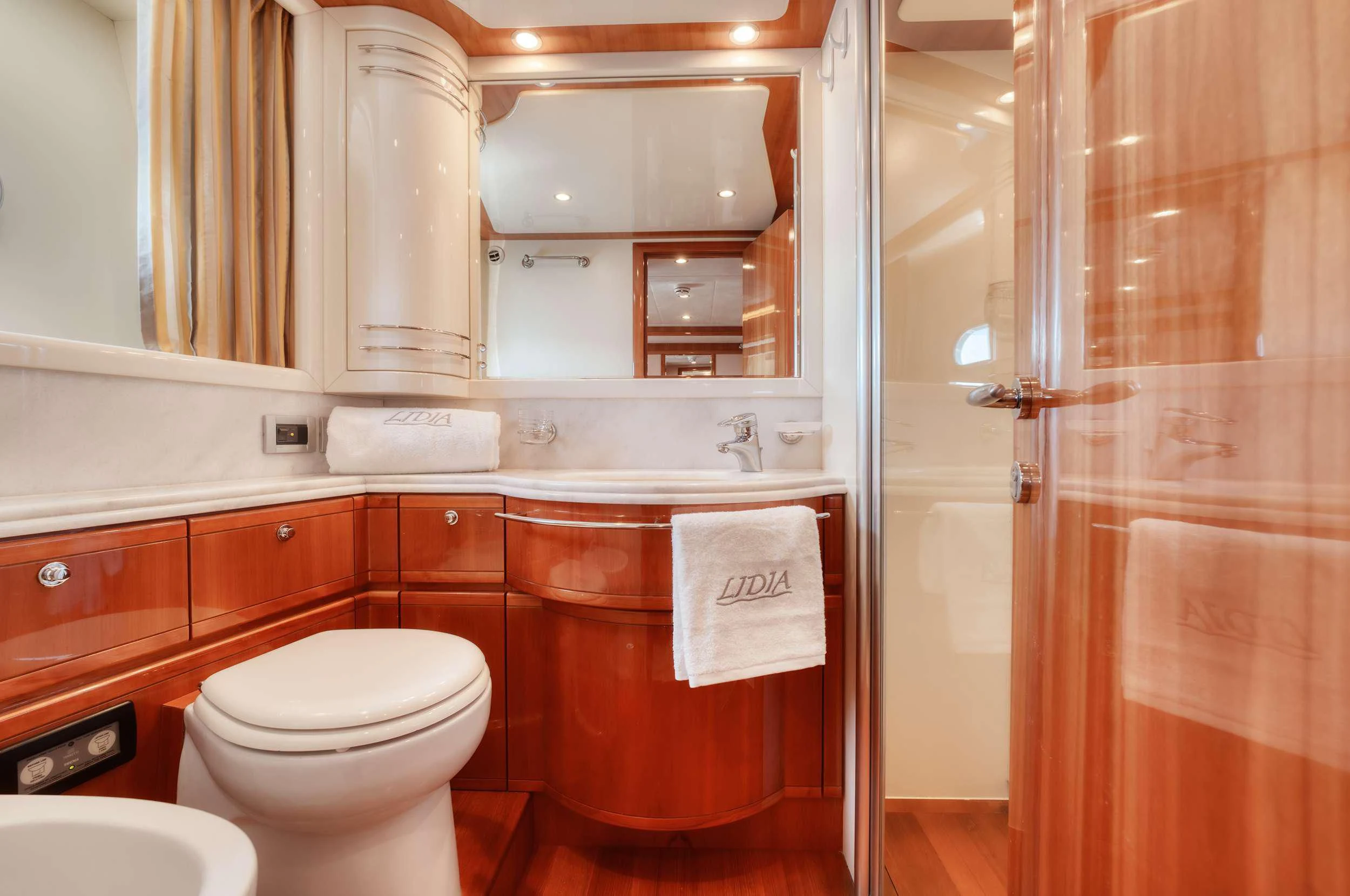 a bathroom with a toilet and a sink aboard LIDIA Yacht for Sale