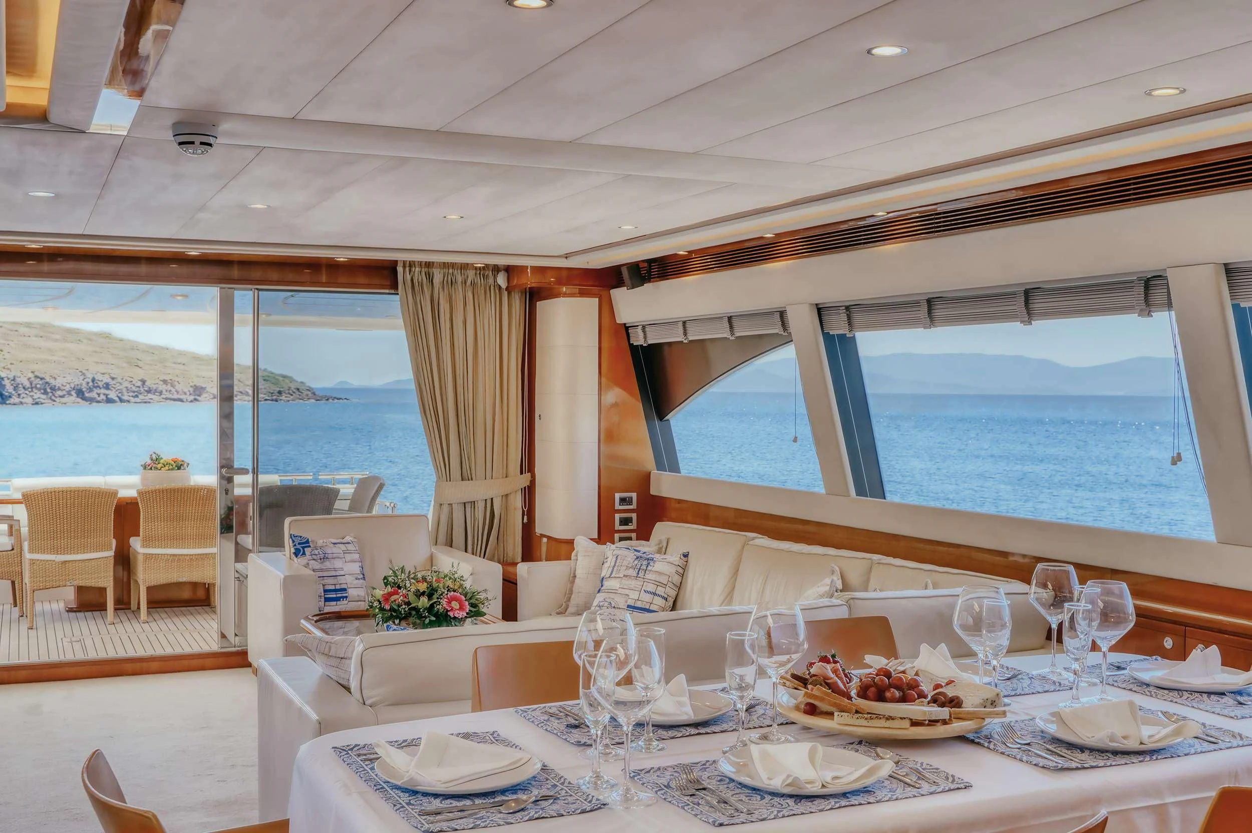 a table set for a meal aboard LIDIA Yacht for Sale