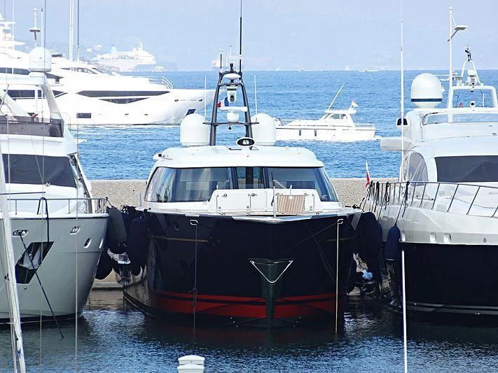 several boats in a harbor aboard BLUE ROSE Yacht for Sale