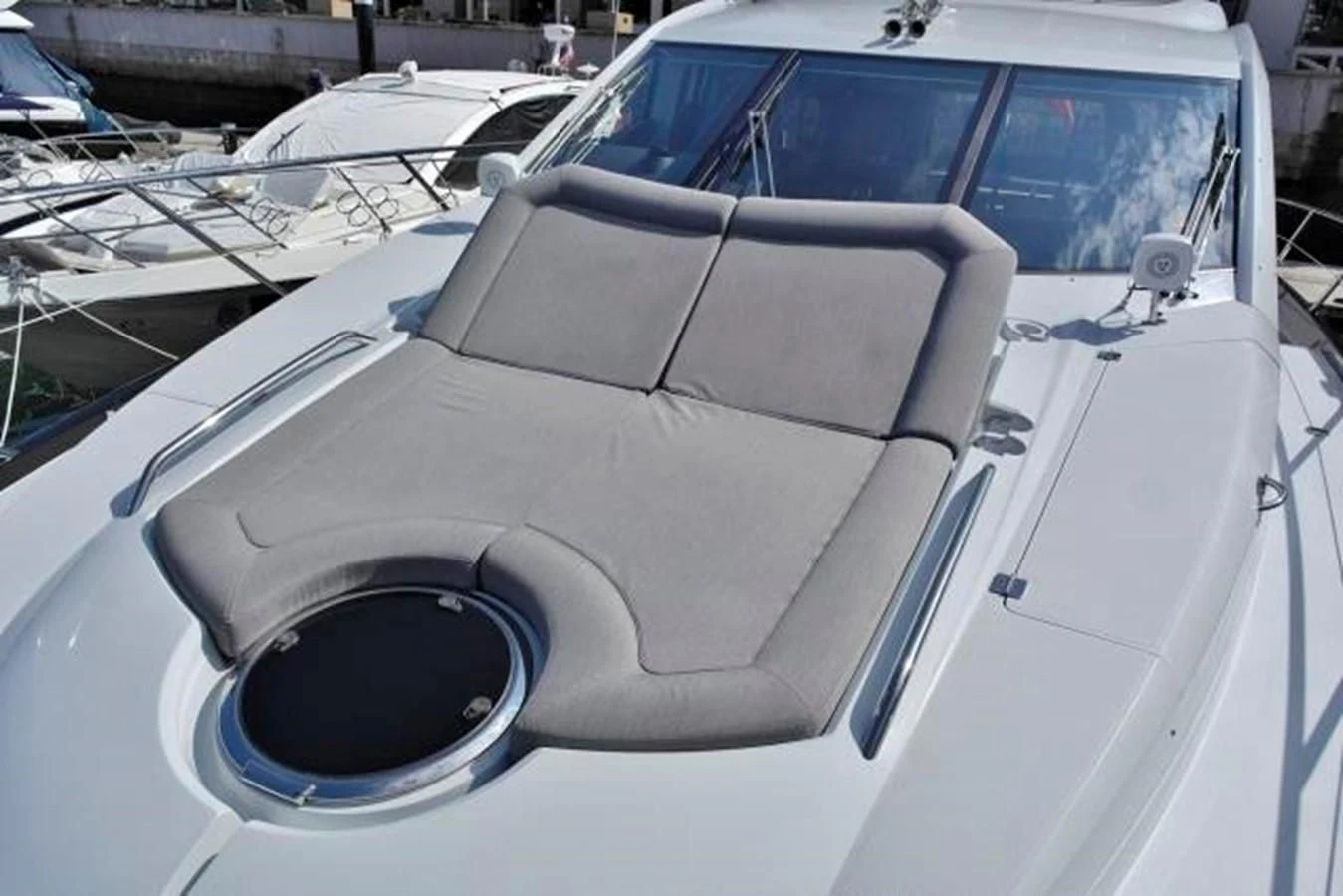 a white car with a black seat aboard SUNSEEKER MANHATTAN 63 Yacht for Sale