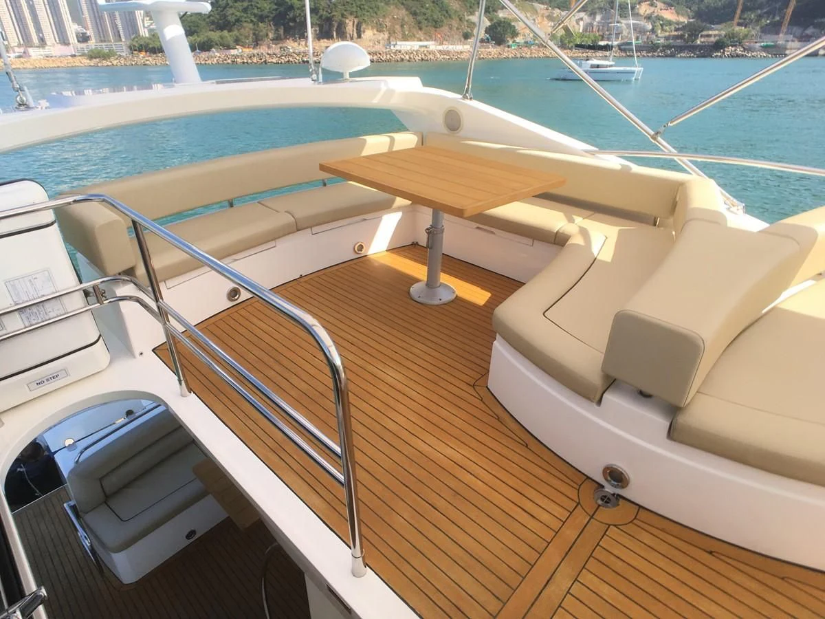 a boat on a deck aboard SUNSEEKER MANHATTAN 63 Yacht for Sale
