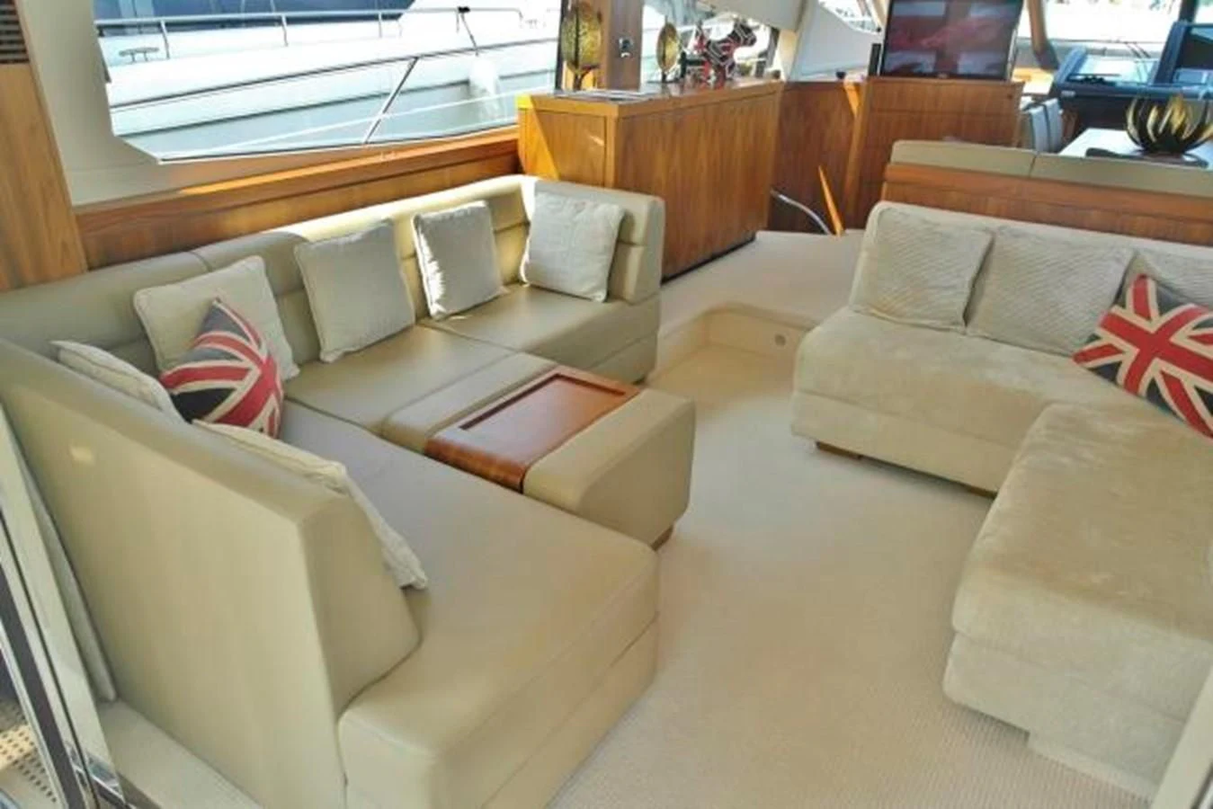 a living room with couches aboard SUNSEEKER MANHATTAN 63 Yacht for Sale