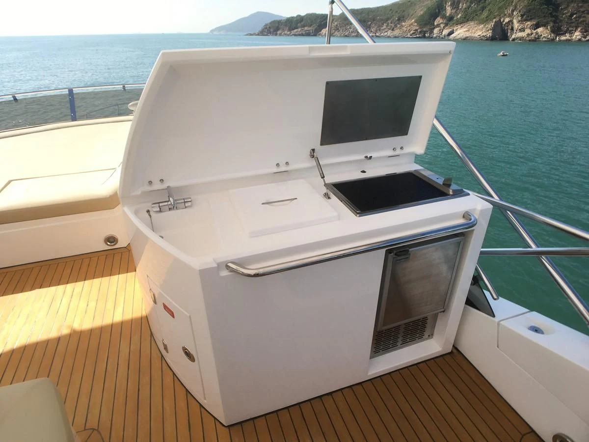 a boat on a deck aboard SUNSEEKER MANHATTAN 63 Yacht for Sale