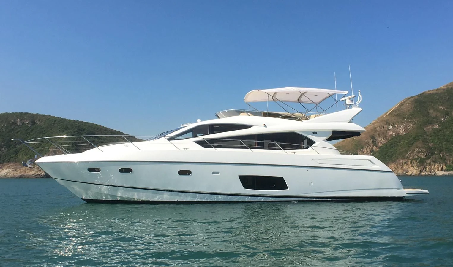 a white yacht in the water aboard SUNSEEKER MANHATTAN 63 Yacht for Sale