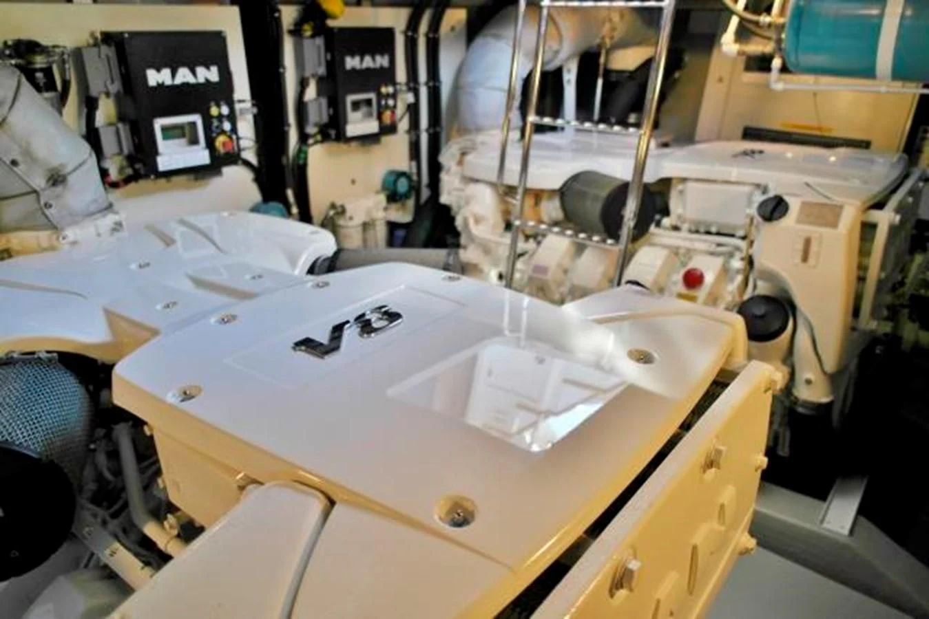 a white machine with a large white object on the side aboard SUNSEEKER MANHATTAN 63 Yacht for Sale
