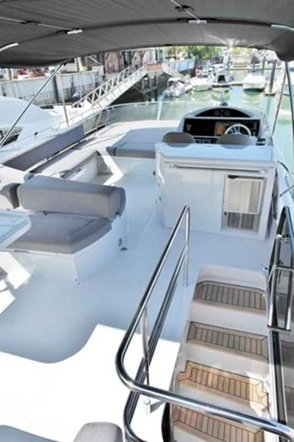 a boat in the water aboard SUNSEEKER MANHATTAN 63 Yacht for Sale