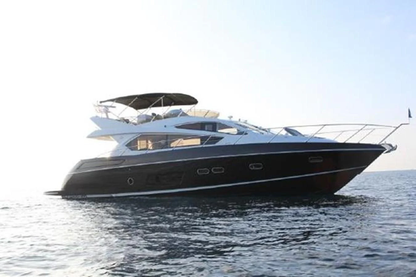 a boat on the water aboard SUNSEEKER MANHATTAN 63 Yacht for Sale