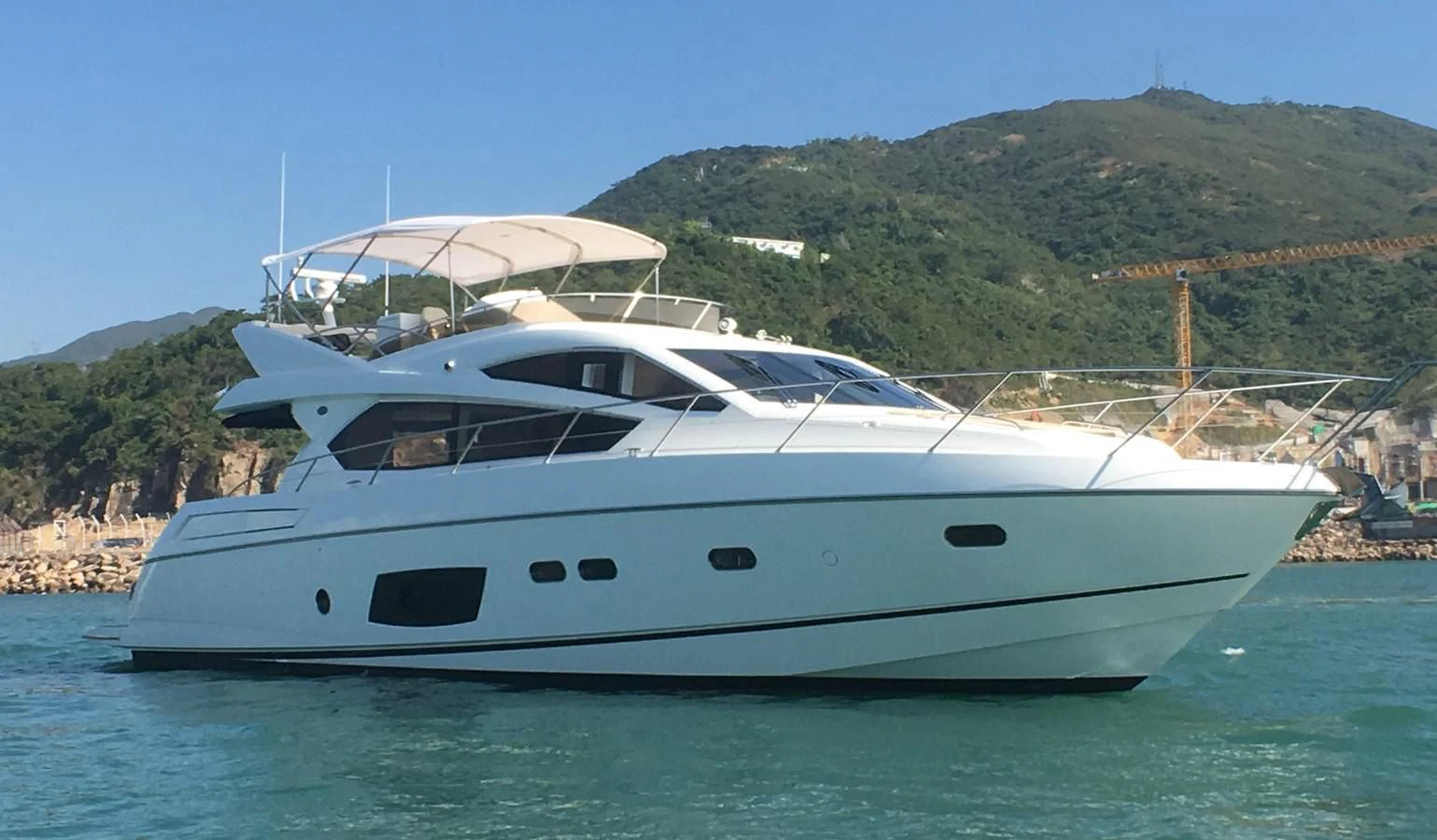 a white yacht in the water aboard SUNSEEKER MANHATTAN 63 Yacht for Sale