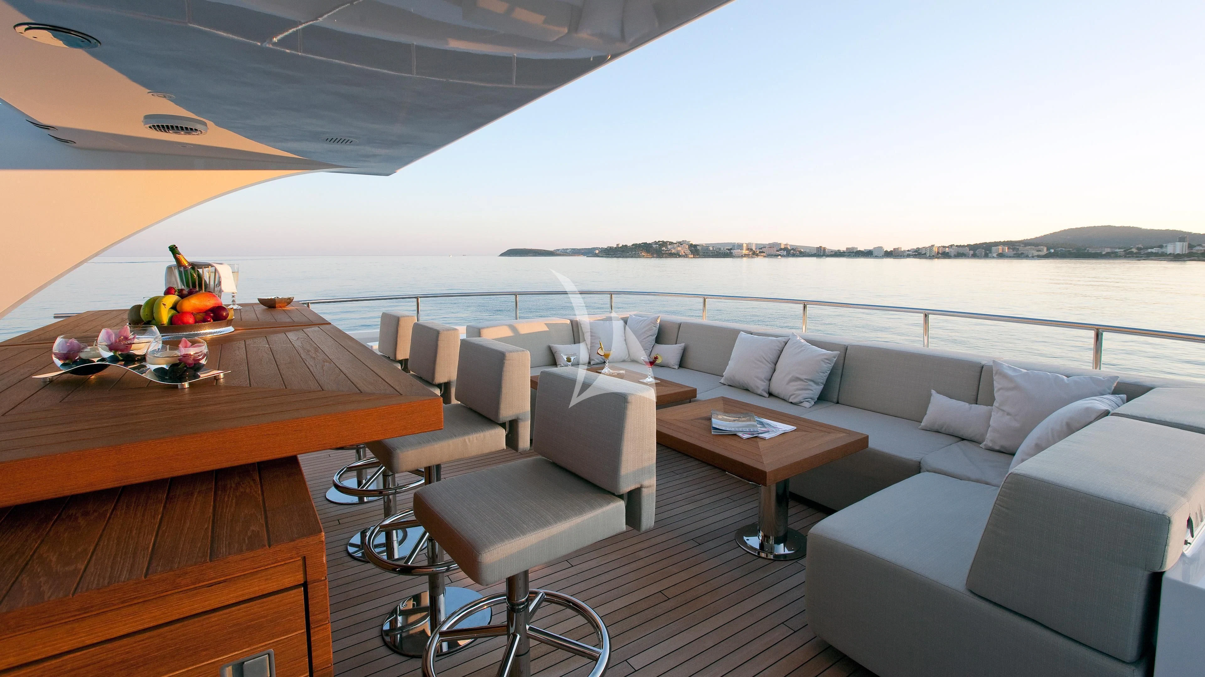 a room with a couch and a table and chairs aboard JEMS Yacht for Sale