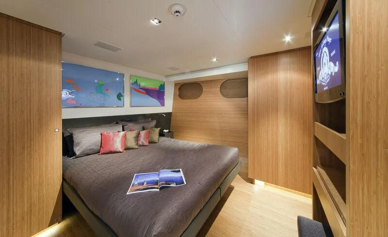 a bed in a room aboard JEMS Yacht for Sale