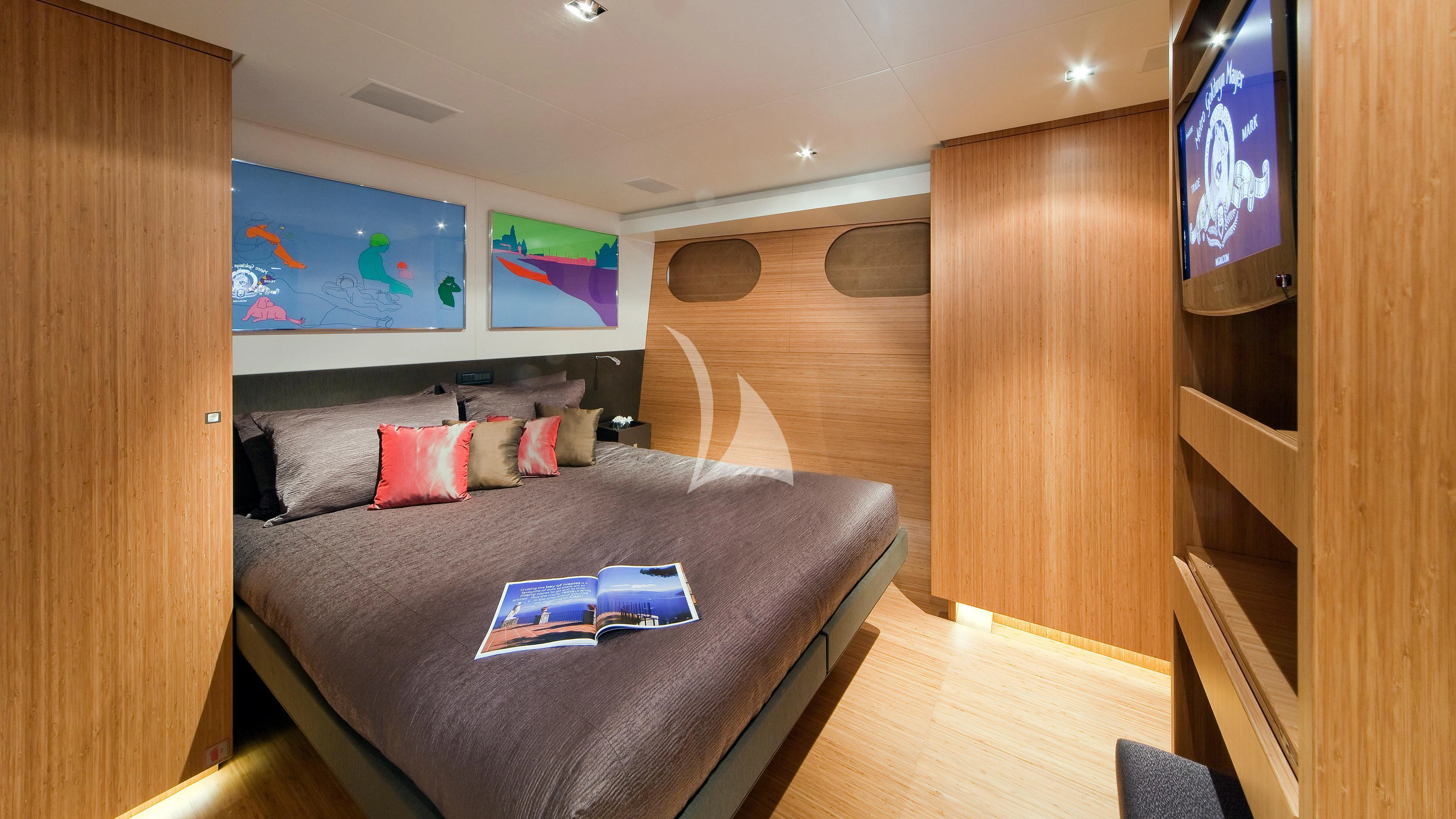 a bed in a room aboard JEMS Yacht for Sale