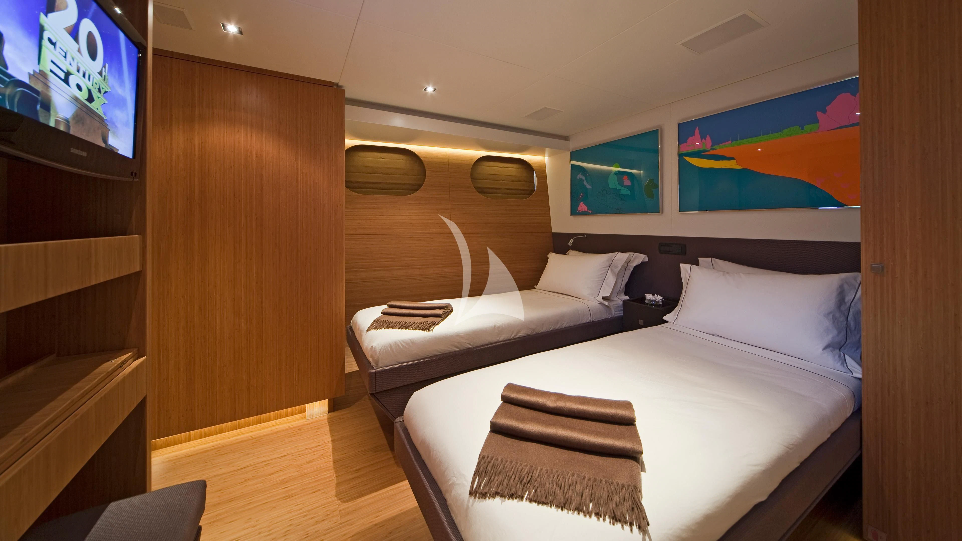 a room with a bed and a tv aboard JEMS Yacht for Sale