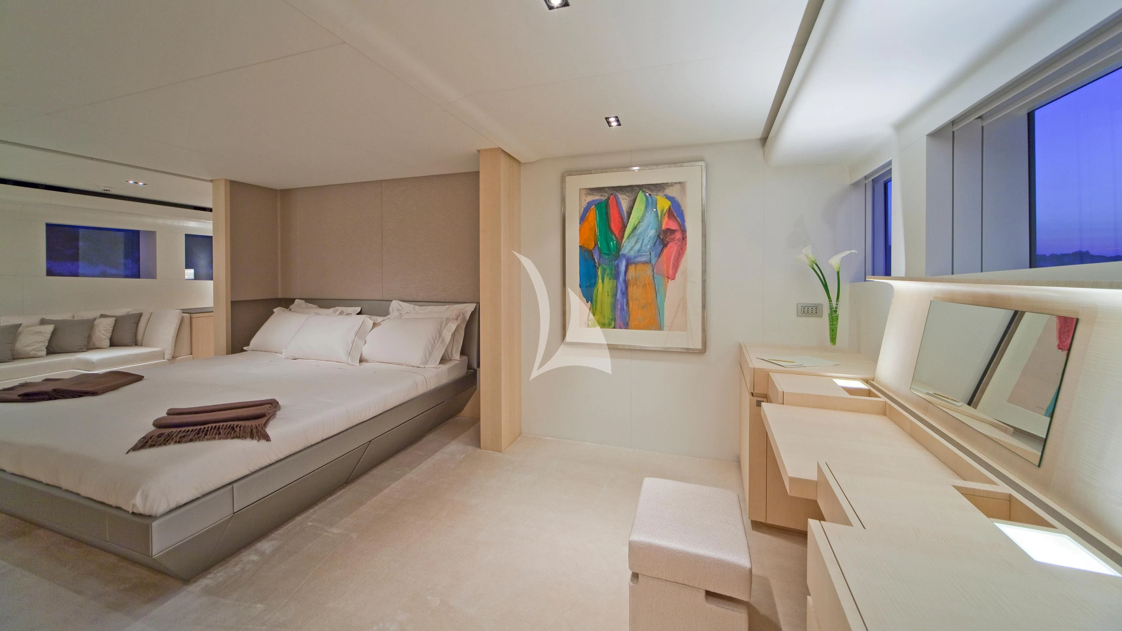 a room with a bed and a desk aboard JEMS Yacht for Sale