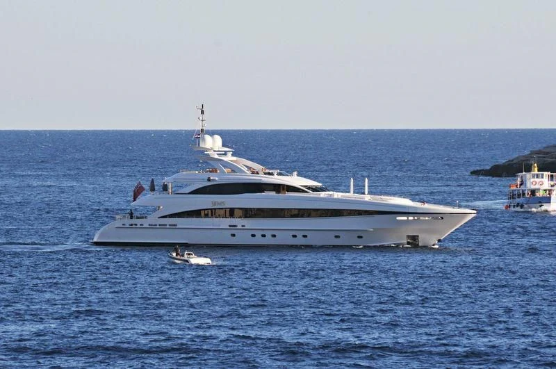 a large ship in the water aboard JEMS Yacht for Sale